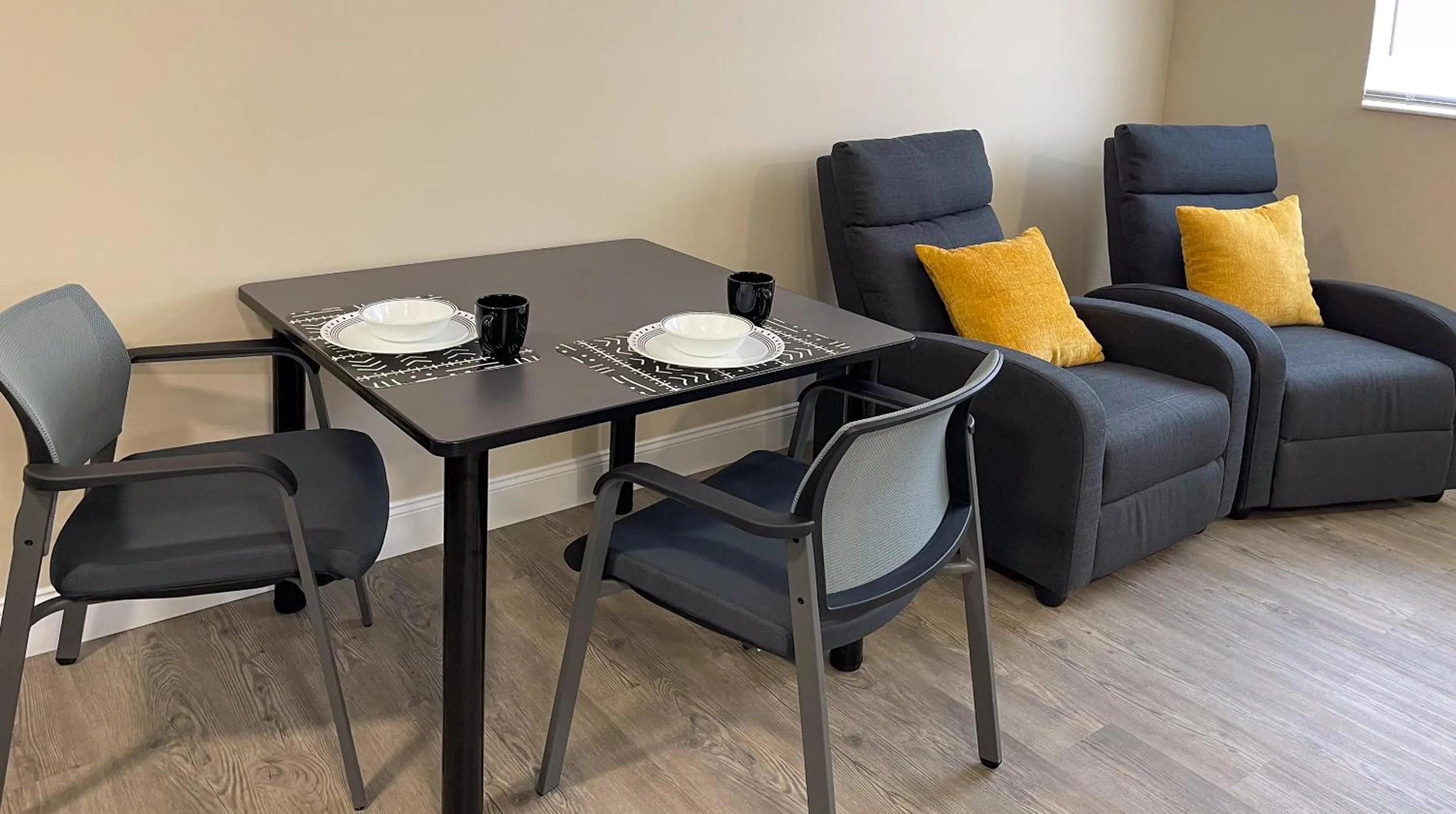 Dining area in Lazy Cuckoo Inn - Sleek and Stylish Studio Apartments