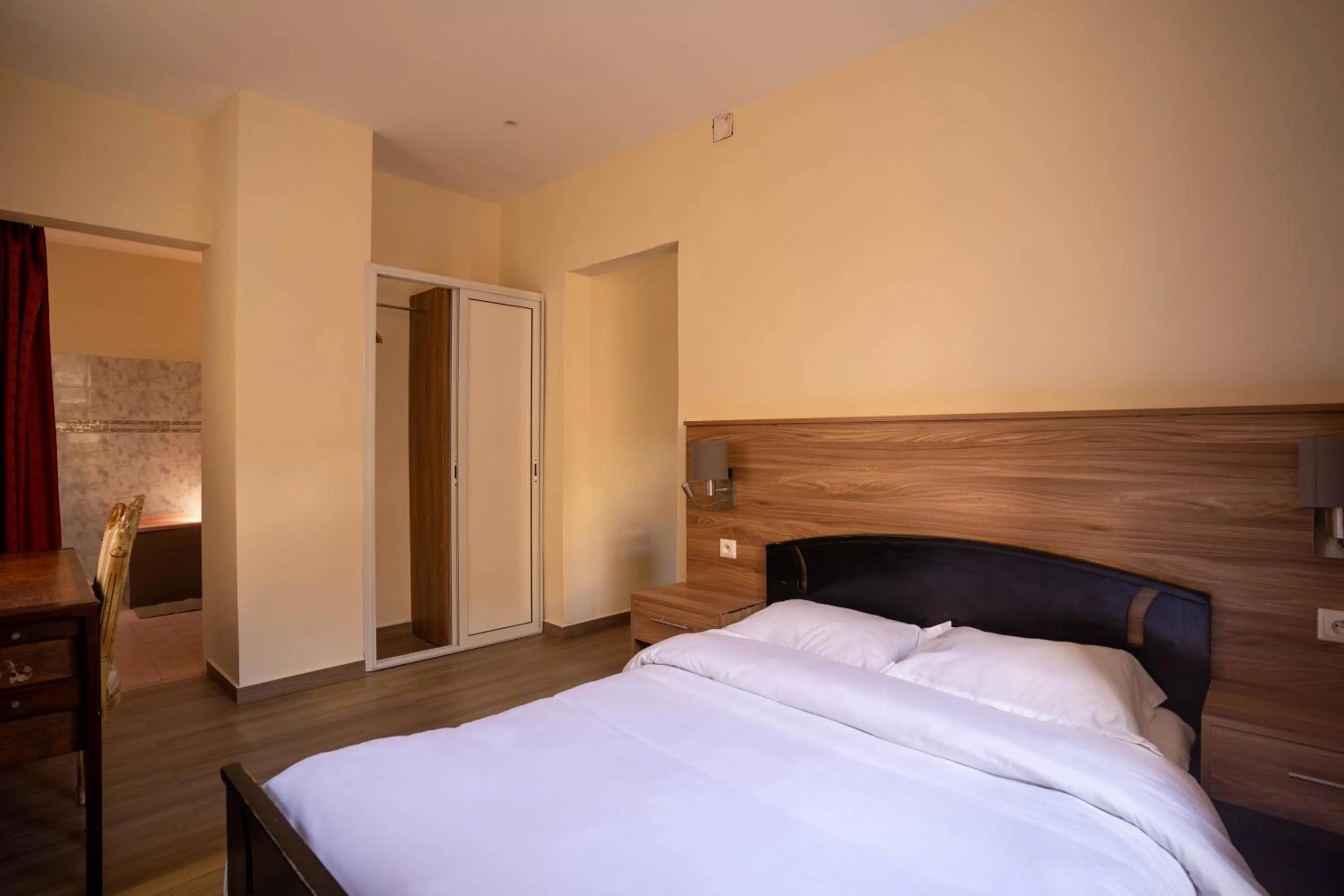 Bed in Aparthotel Madeleine