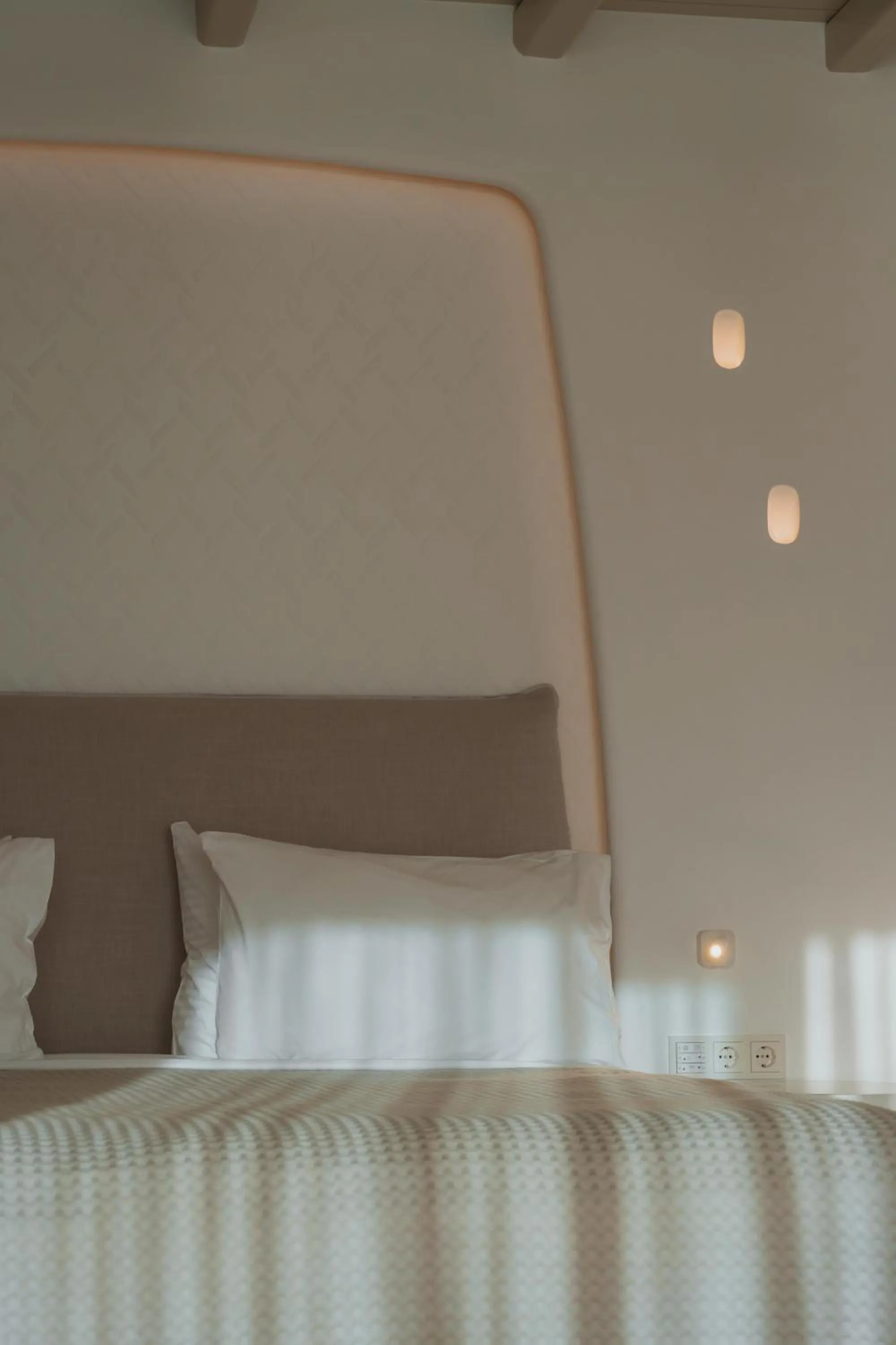 Bed in Nomia Sunset Suites Mykonos