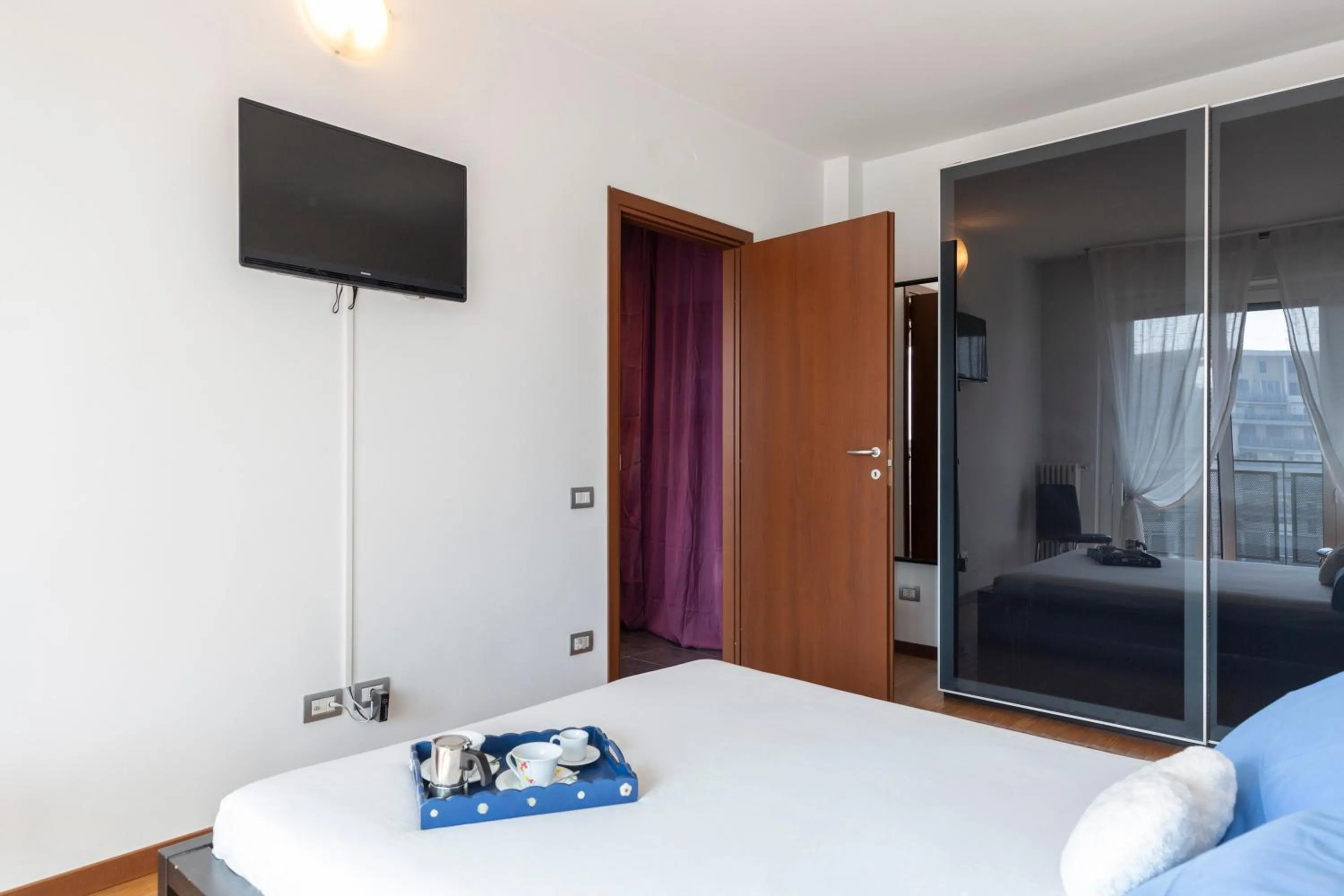 Photo of the whole room, Bed in Sky Home Santa Giulia