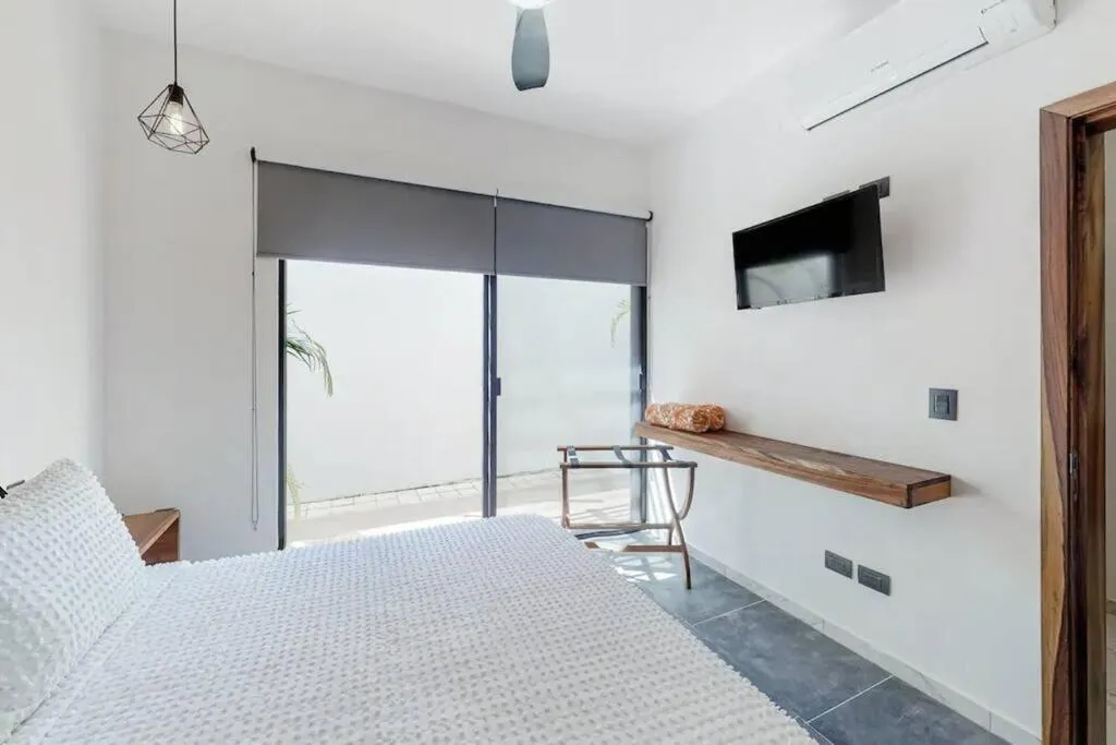 Bed in Contemporary poolside Condo, Wi-Fi - Paraiso Kaanal 101