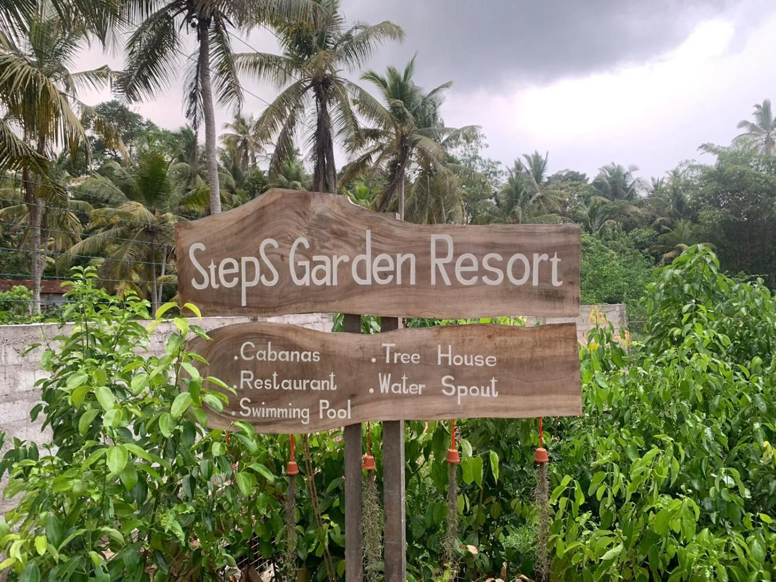 Property logo or sign in Steps Garden Resort