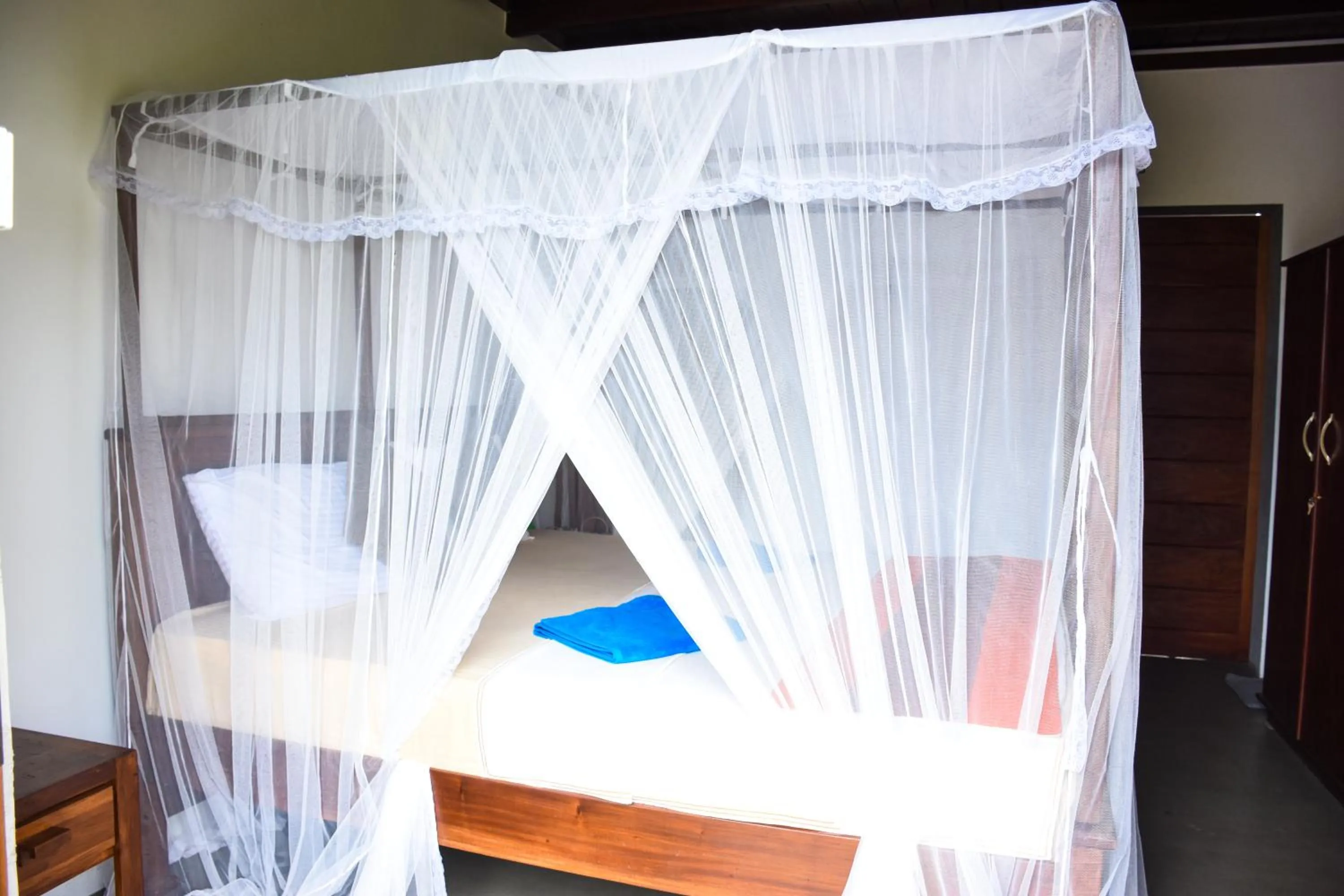 Bed in Steps Garden Resort