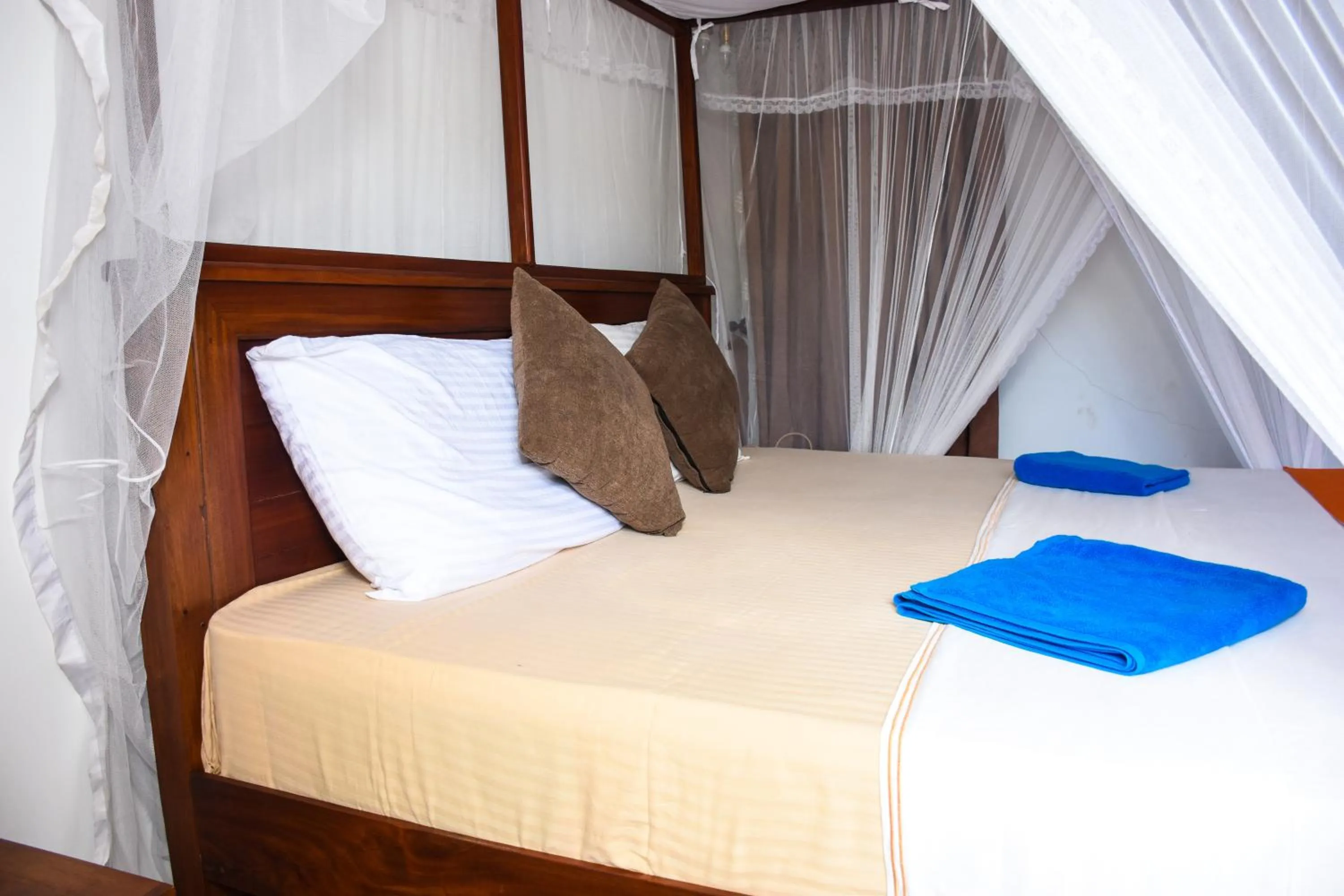 Bed in Steps Garden Resort