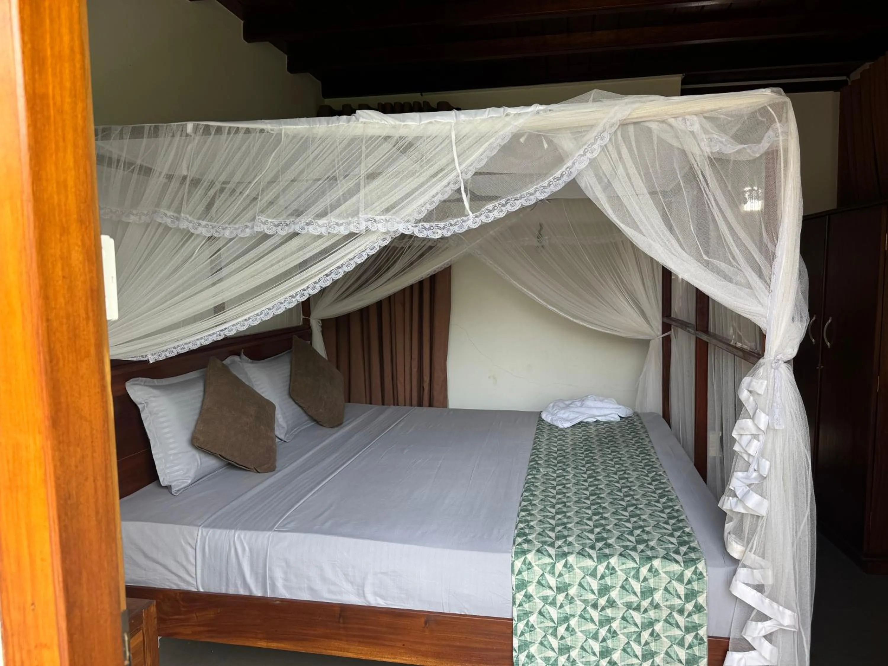 Bed in Steps Garden Resort