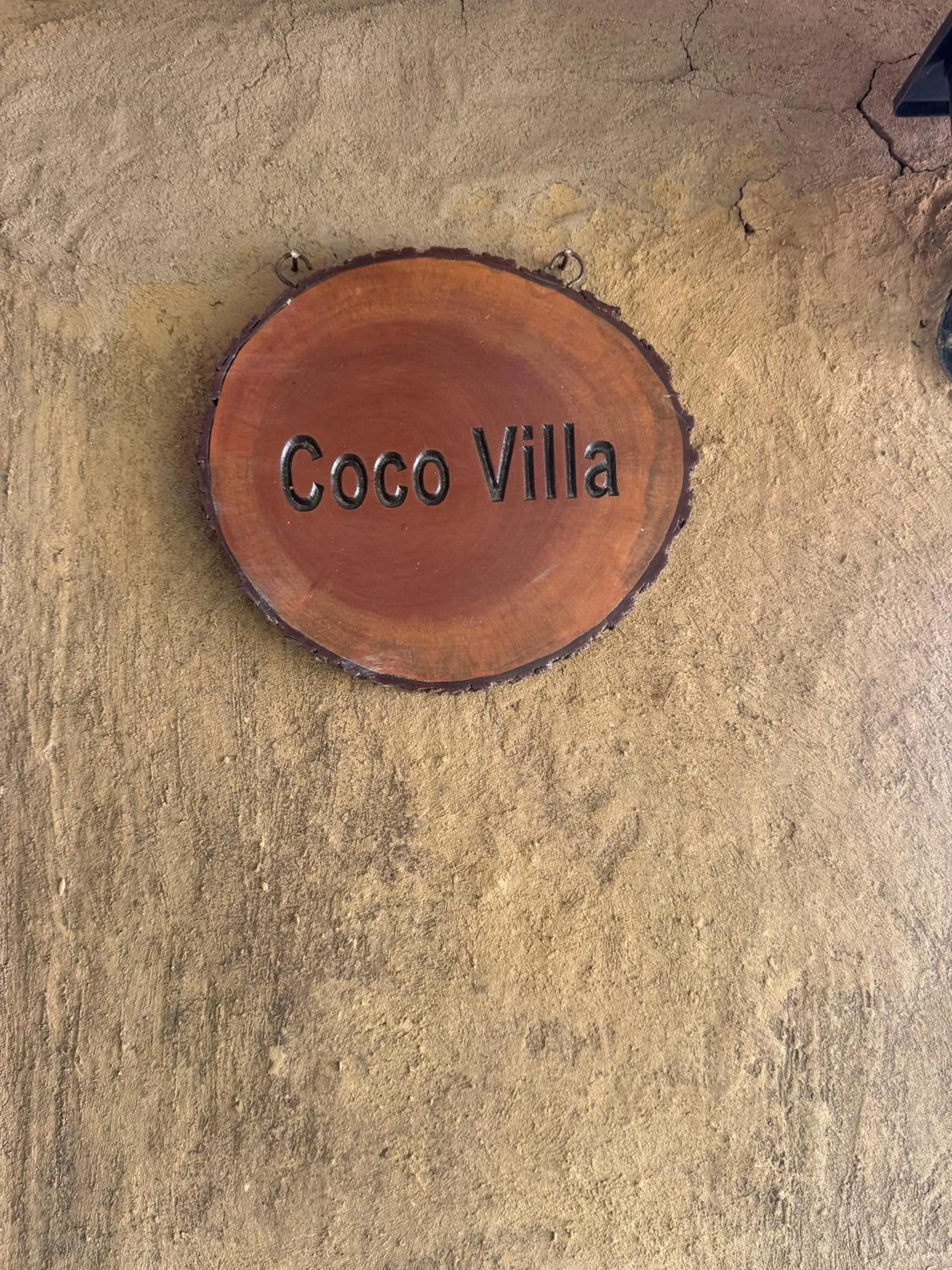 Property logo or sign in Steps Garden Resort