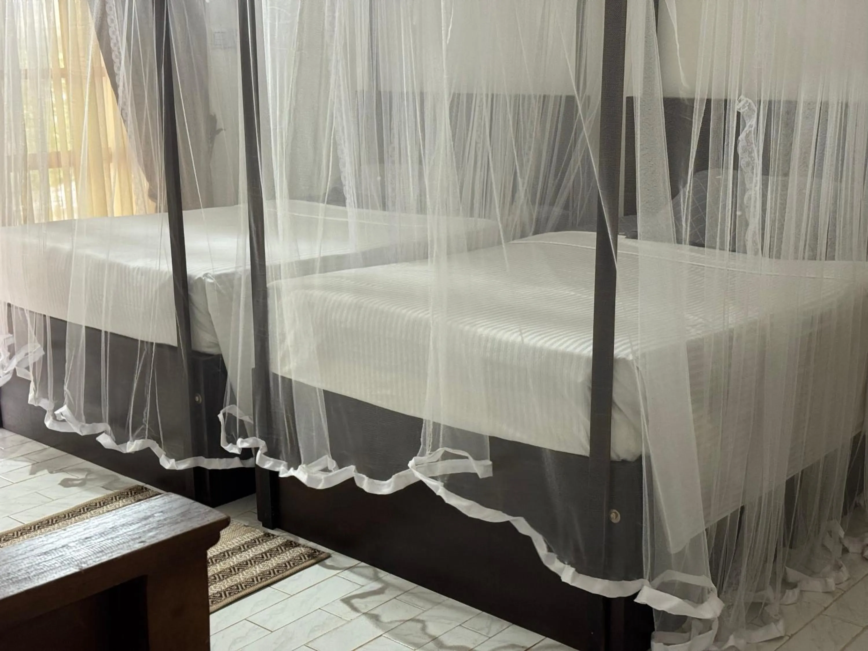 Bed in Steps Garden Resort