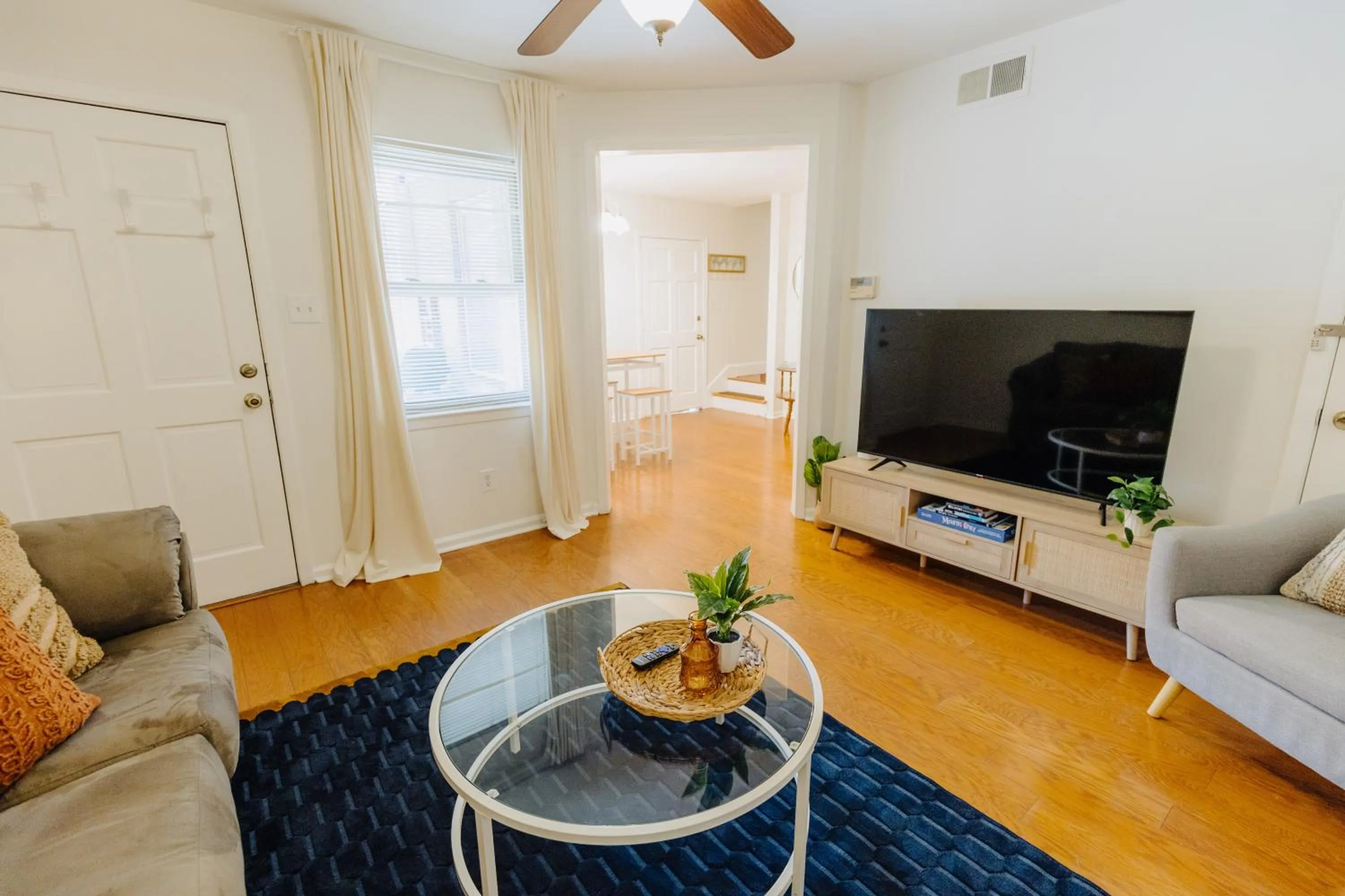 Living room in Centrally Located 2BR Overton Square Unit 2 Fast WiFi Free Parking Yes Pets