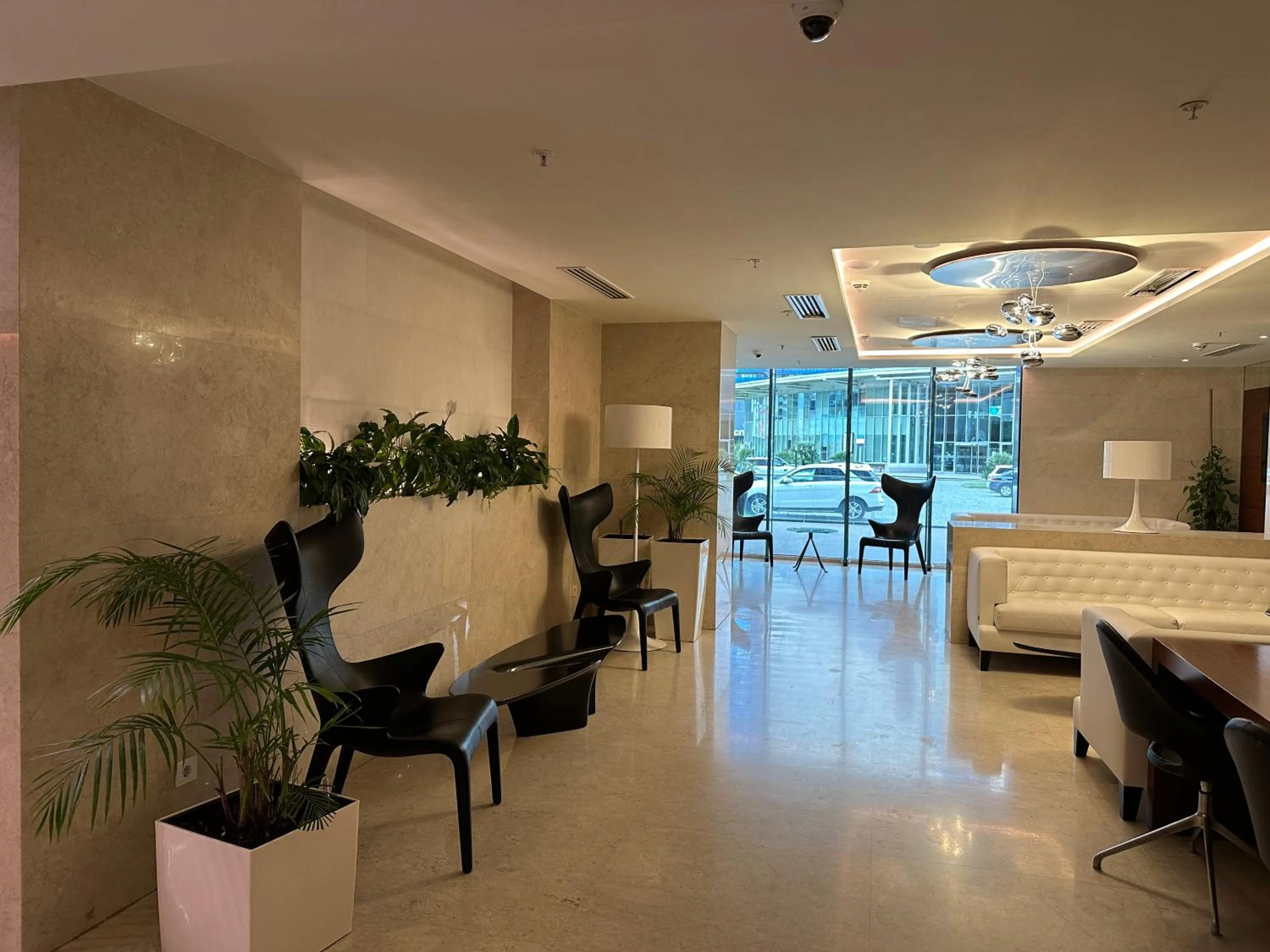 Communal lounge/ TV room in Dream Apartments at Alliance Palace