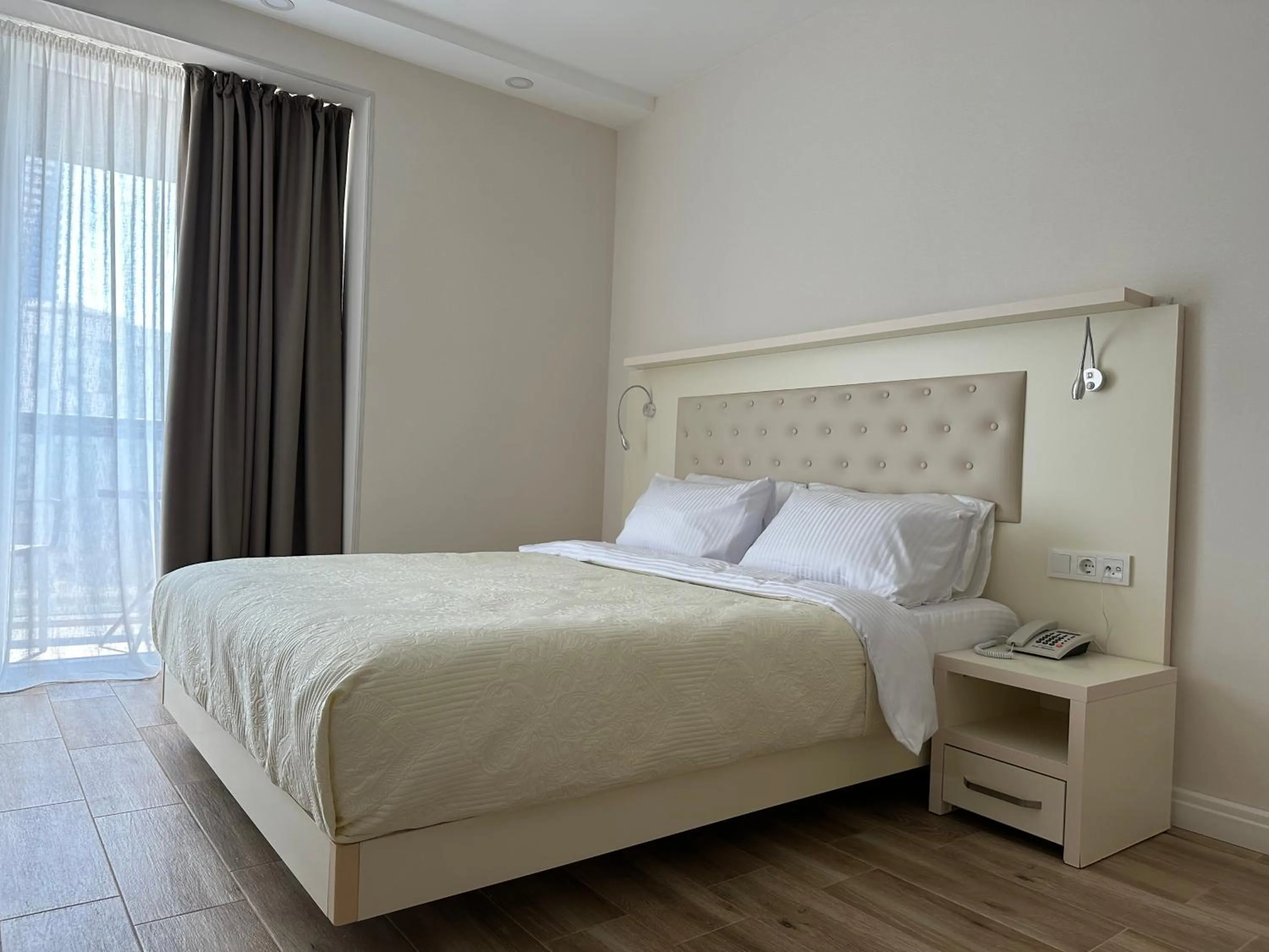 Bed in Dream Apartments at Alliance Palace