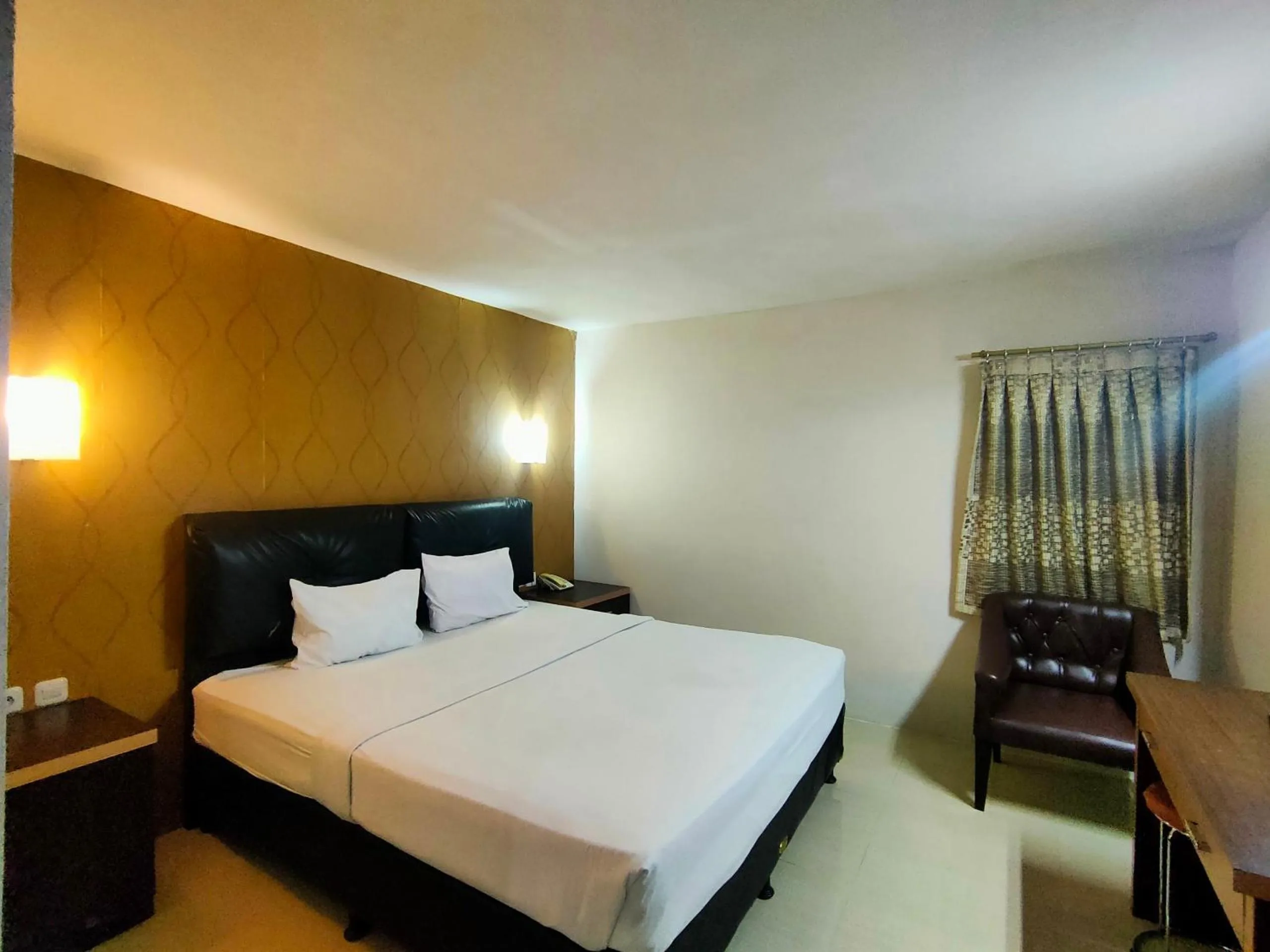 Bedroom in Hotel O Hasma Jaya Syariah