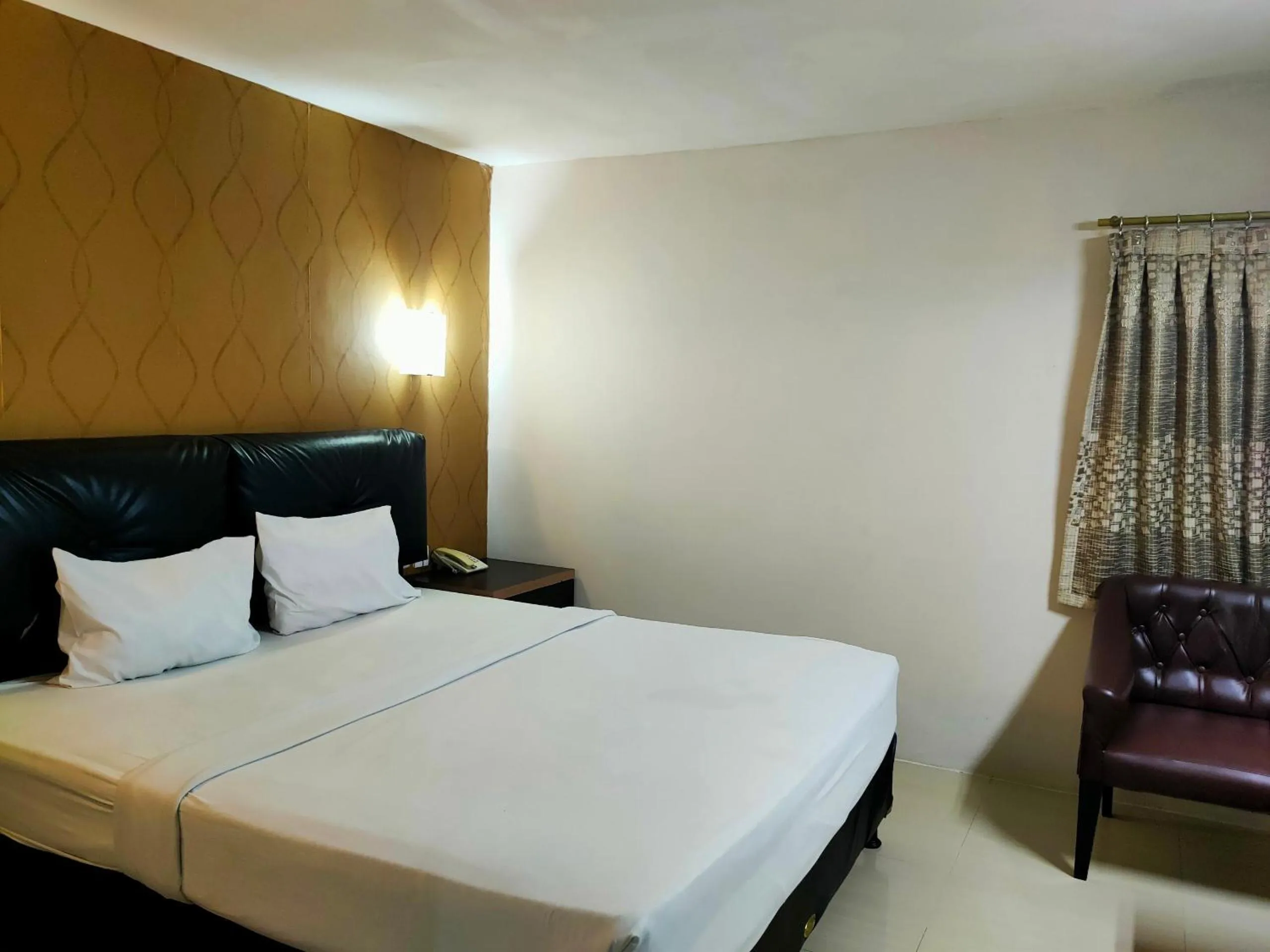 Bedroom in Hotel O Hasma Jaya Syariah