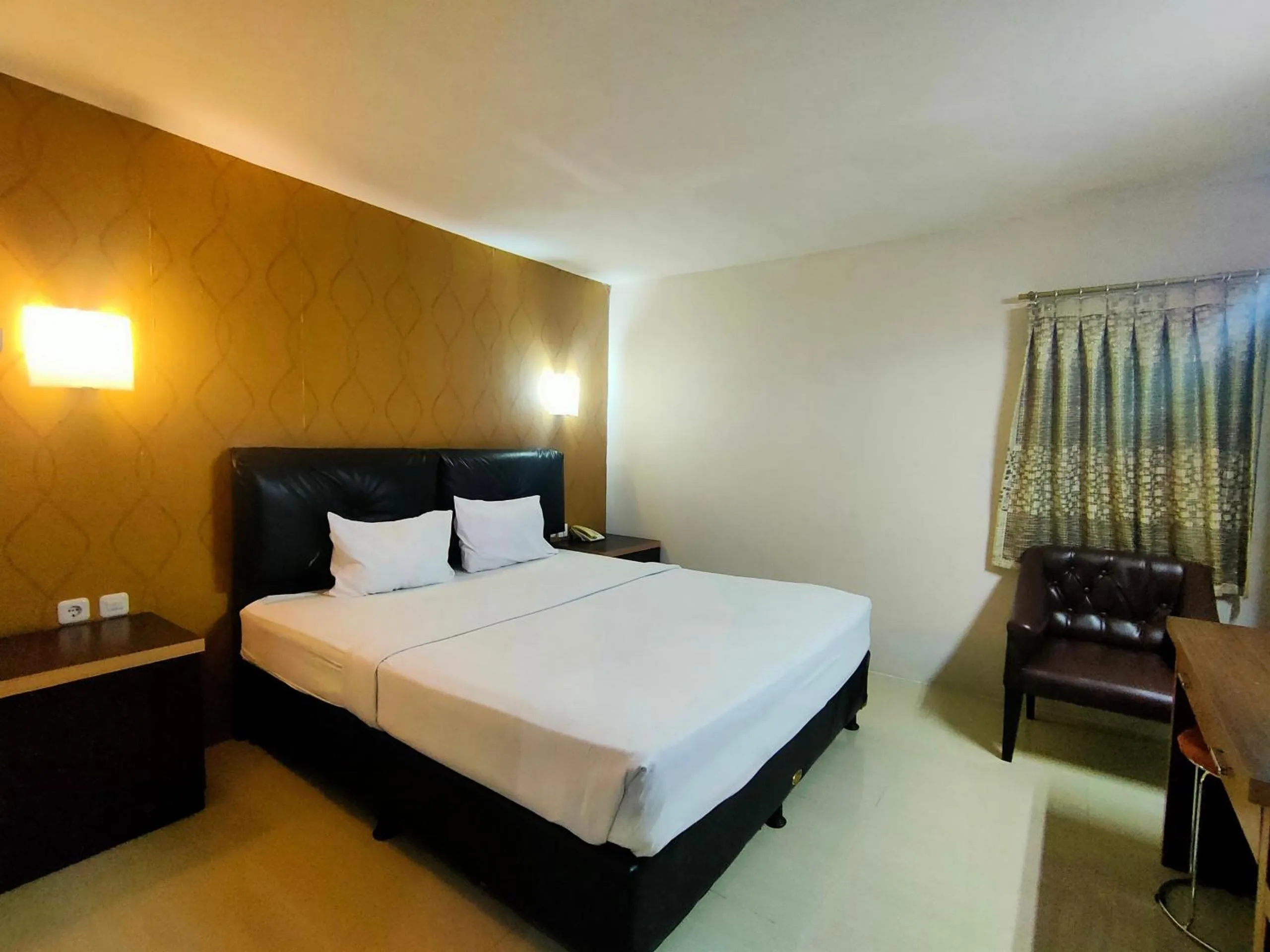 Bedroom in Hotel O Hasma Jaya Syariah