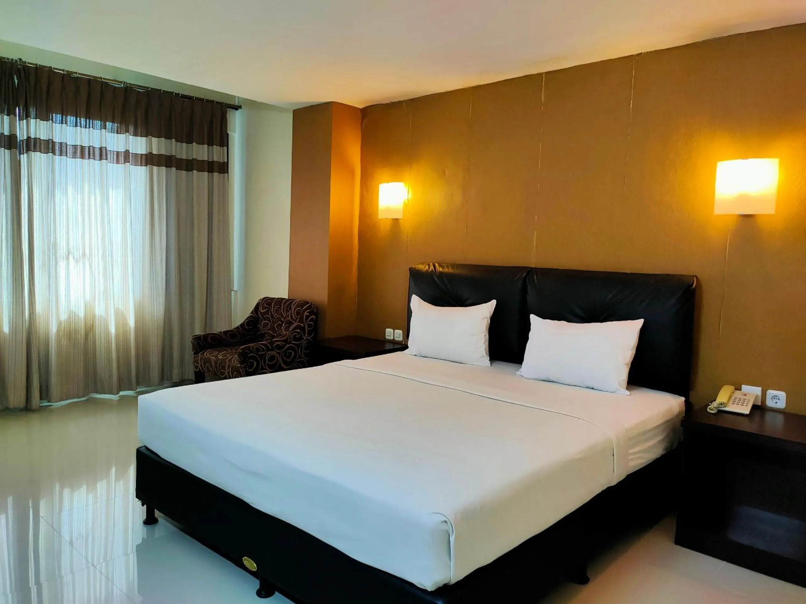 Bedroom in Hotel O Hasma Jaya Syariah