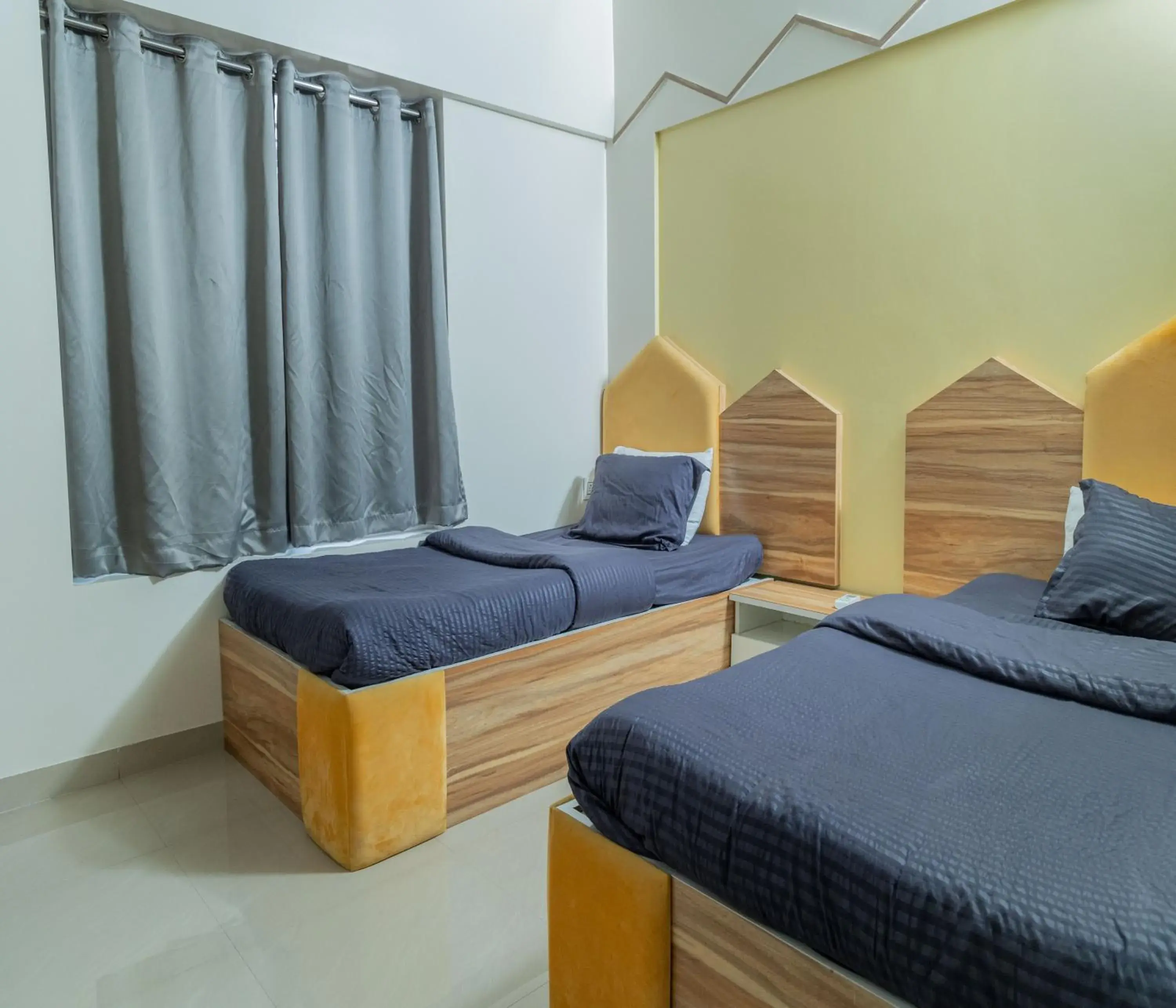 One Bedroom Apartment with Twin Bed and Mountain View in Copper 11 Service Apartments -SB Road, Shivaji Nagar, Pune One Bedroom Apartment with Twin Bed and Mountain View in Copper 11 Service Apartments -SB Road, Shivaji Nagar, Pune