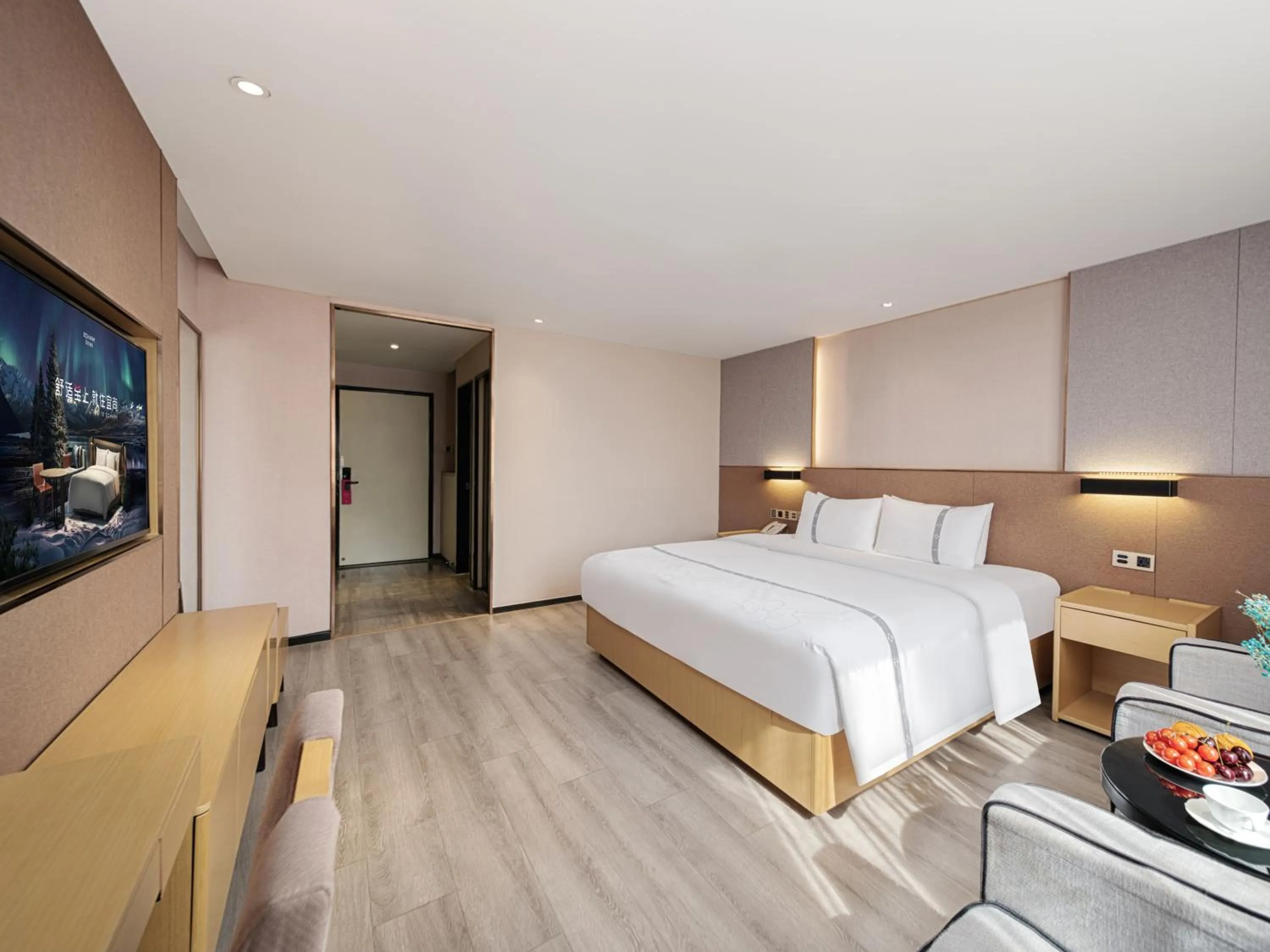 Communal lounge/ TV room, Bed in Yishang Hotel - Guangzhou Railway Station Yuexiu Park Subway Station