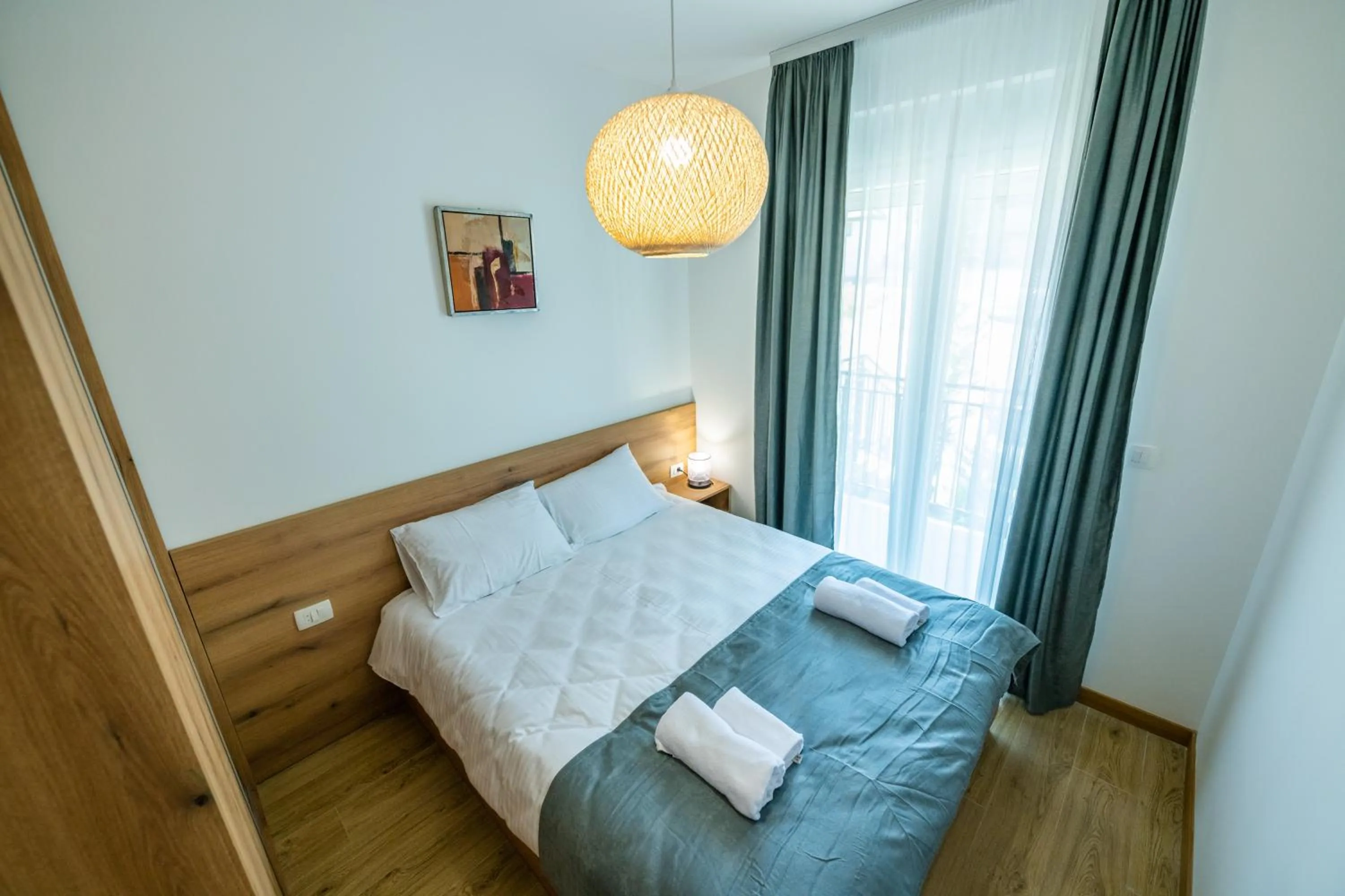 View (from property/room), Bed in Pini Apart-hotel