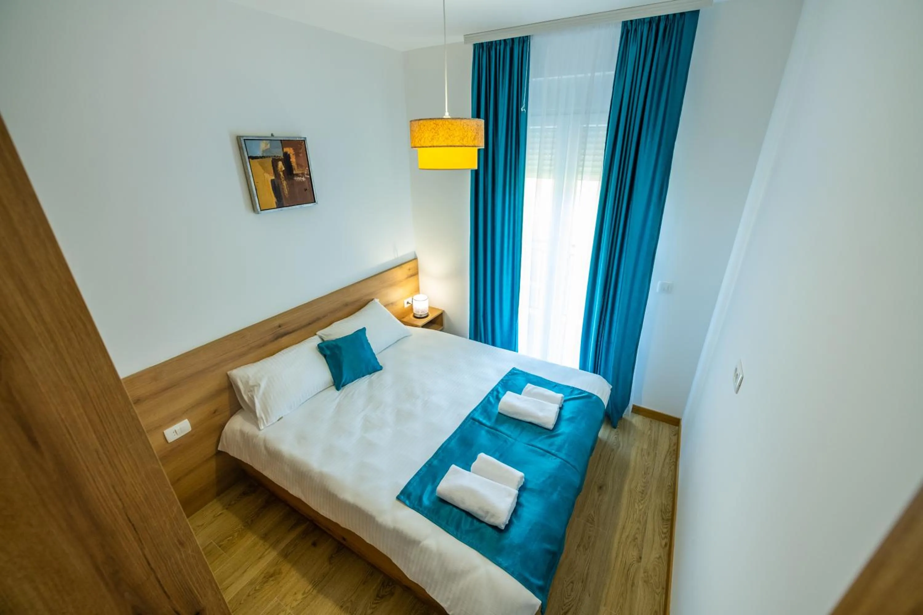 View (from property/room), Bed in Pini Apart-hotel