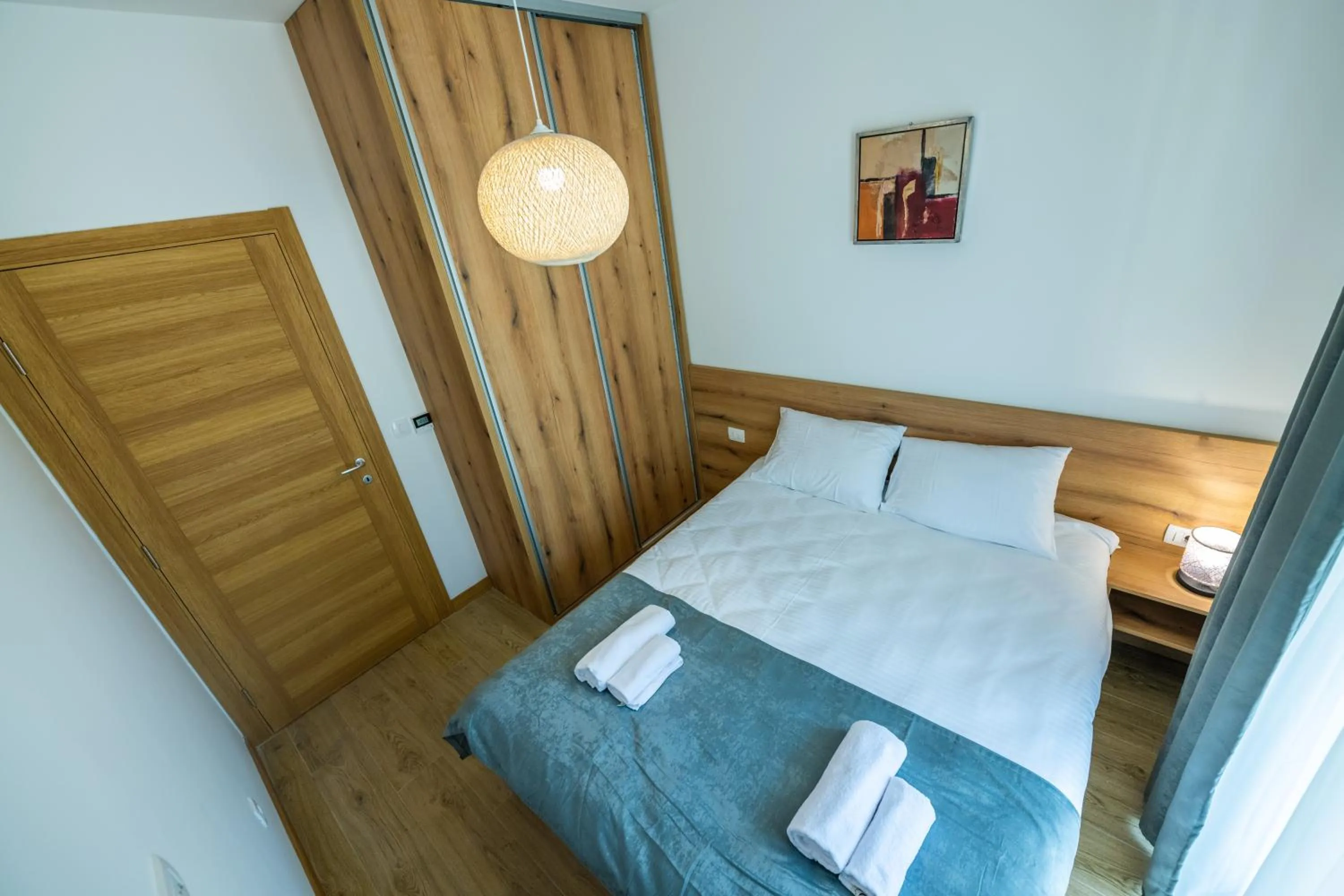 View (from property/room), Bed in Pini Apart-hotel