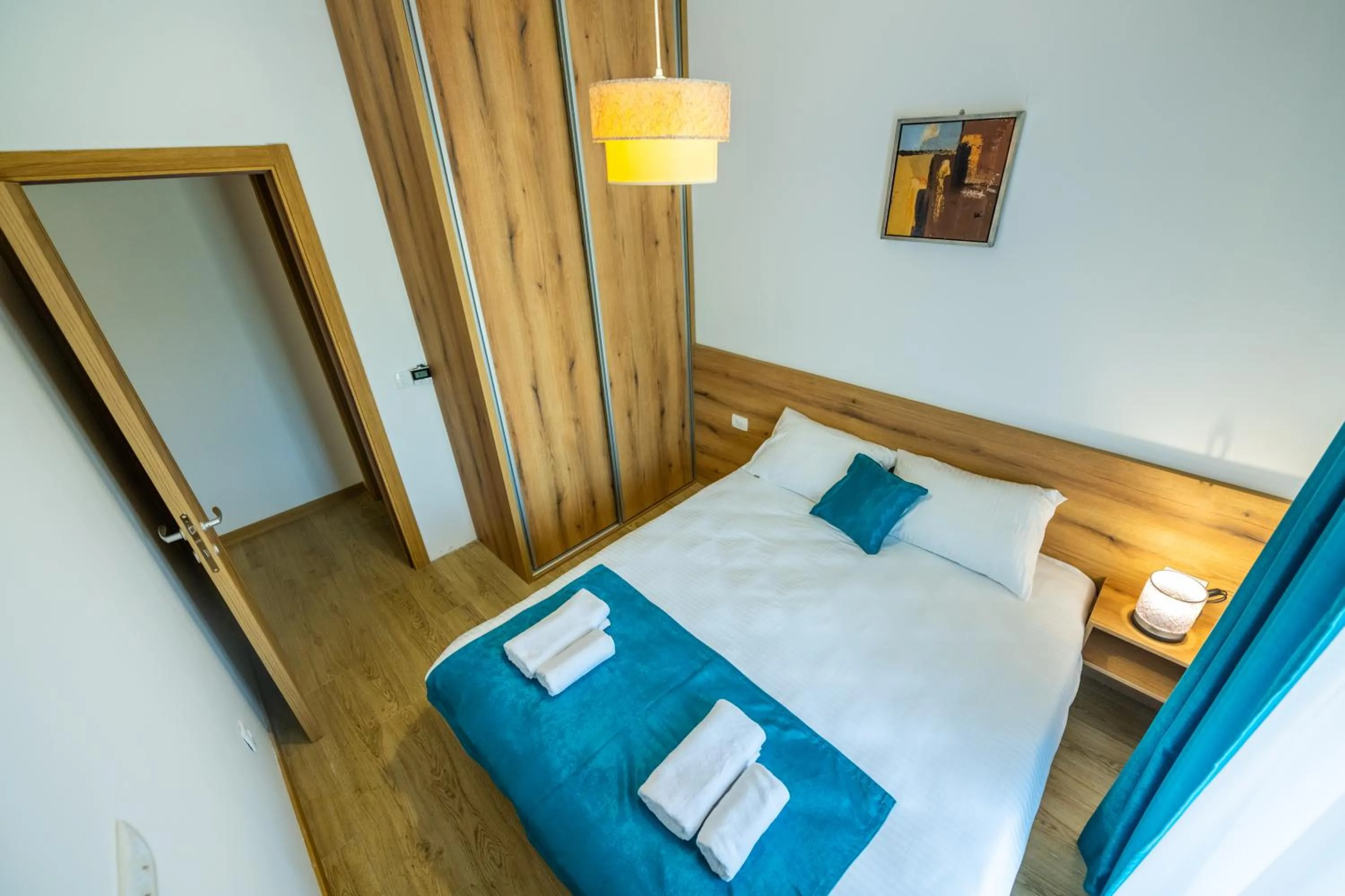 View (from property/room), Bed in Pini Apart-hotel