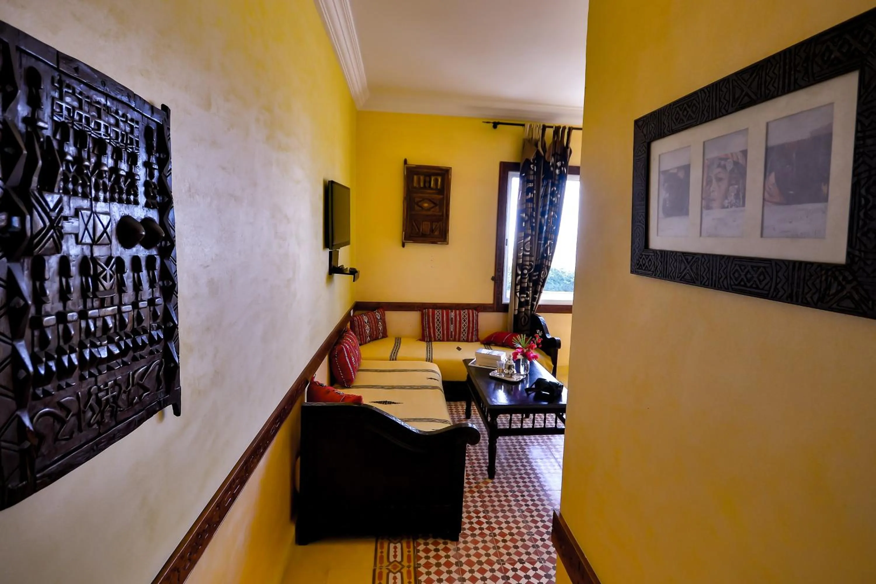 Living room, Bed in Riad Zahra