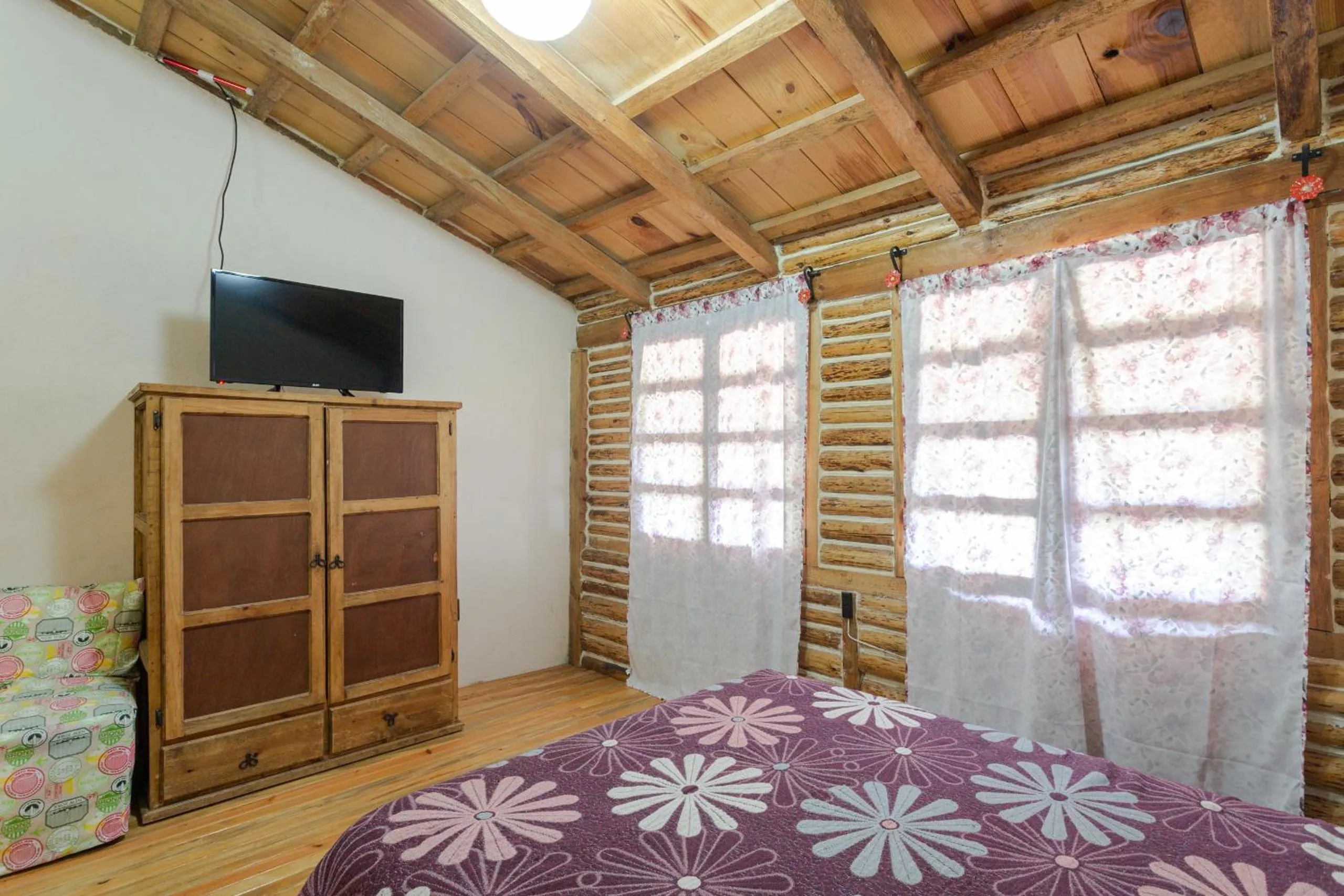 Communal lounge/ TV room, Bed in Hotel Boutique El Rincón