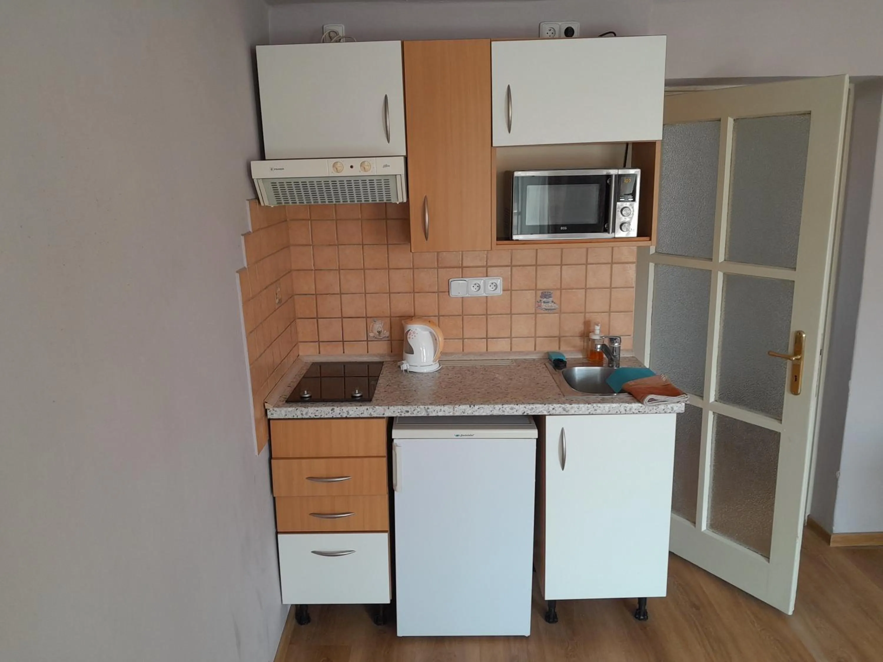 Kitchen or kitchenette in Apartments Kájovská 63