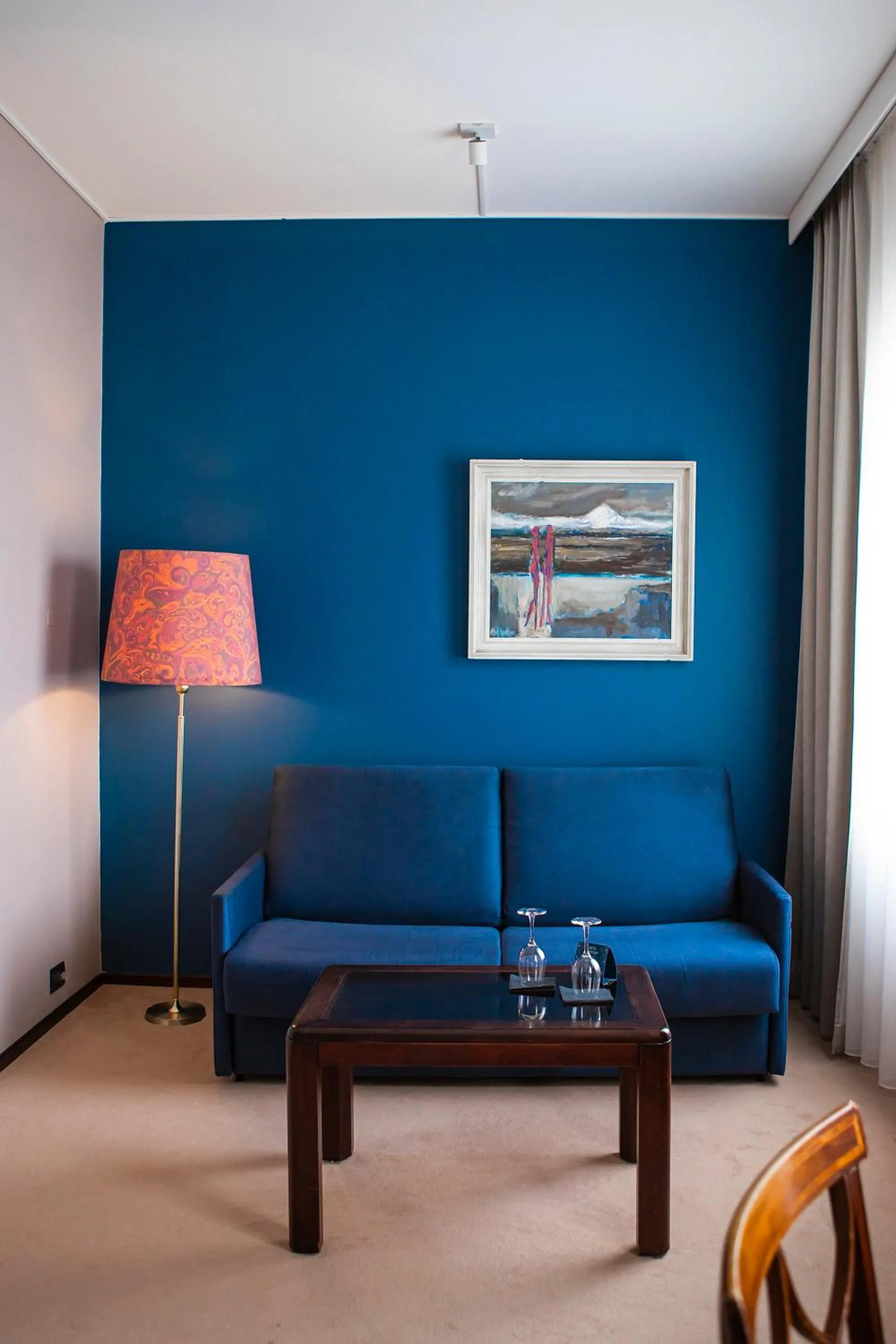 Seating area in Hotel Holt - The Art Hotel