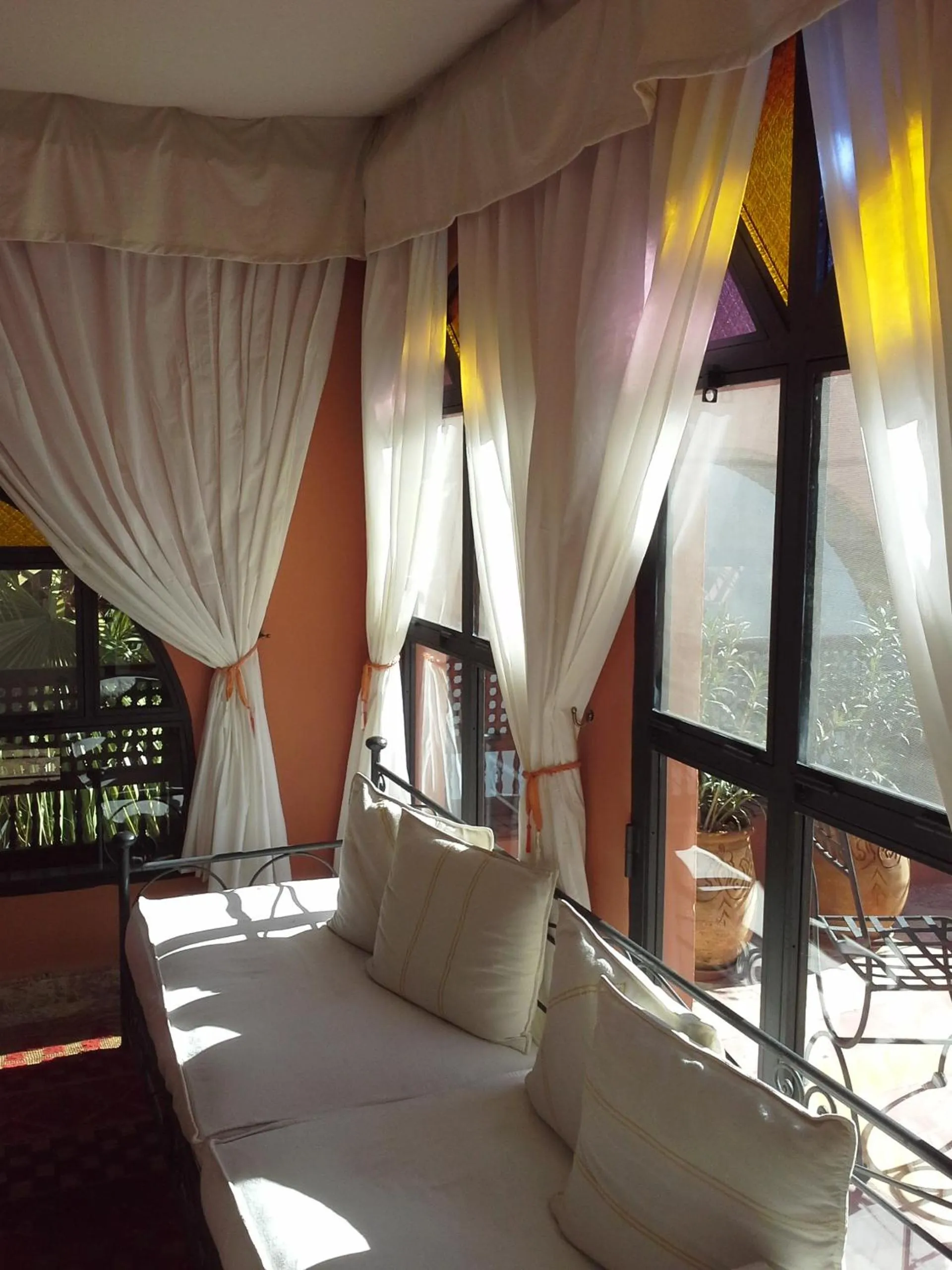 Living room, Bed in Riad Maison Arabo-Andalouse