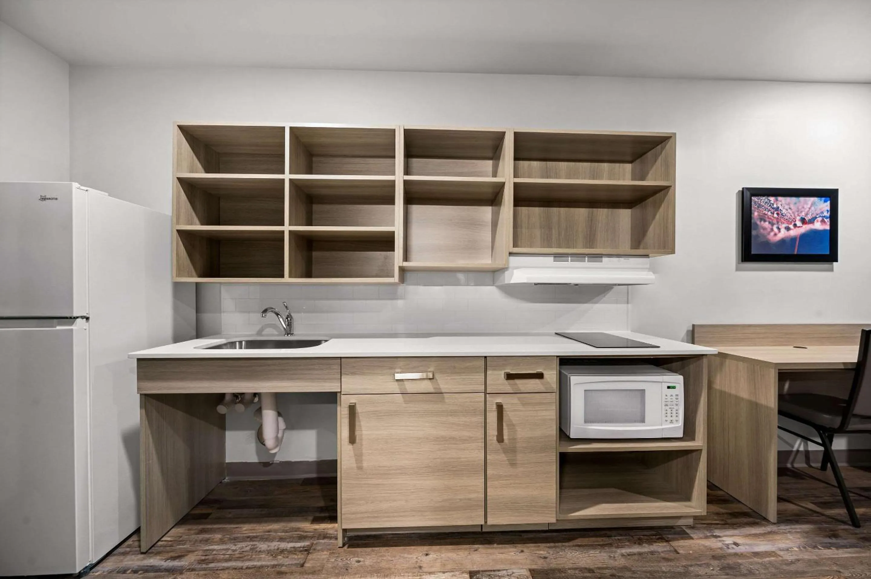 Kitchen or kitchenette in WoodSpring Suites Dearborn Detroit