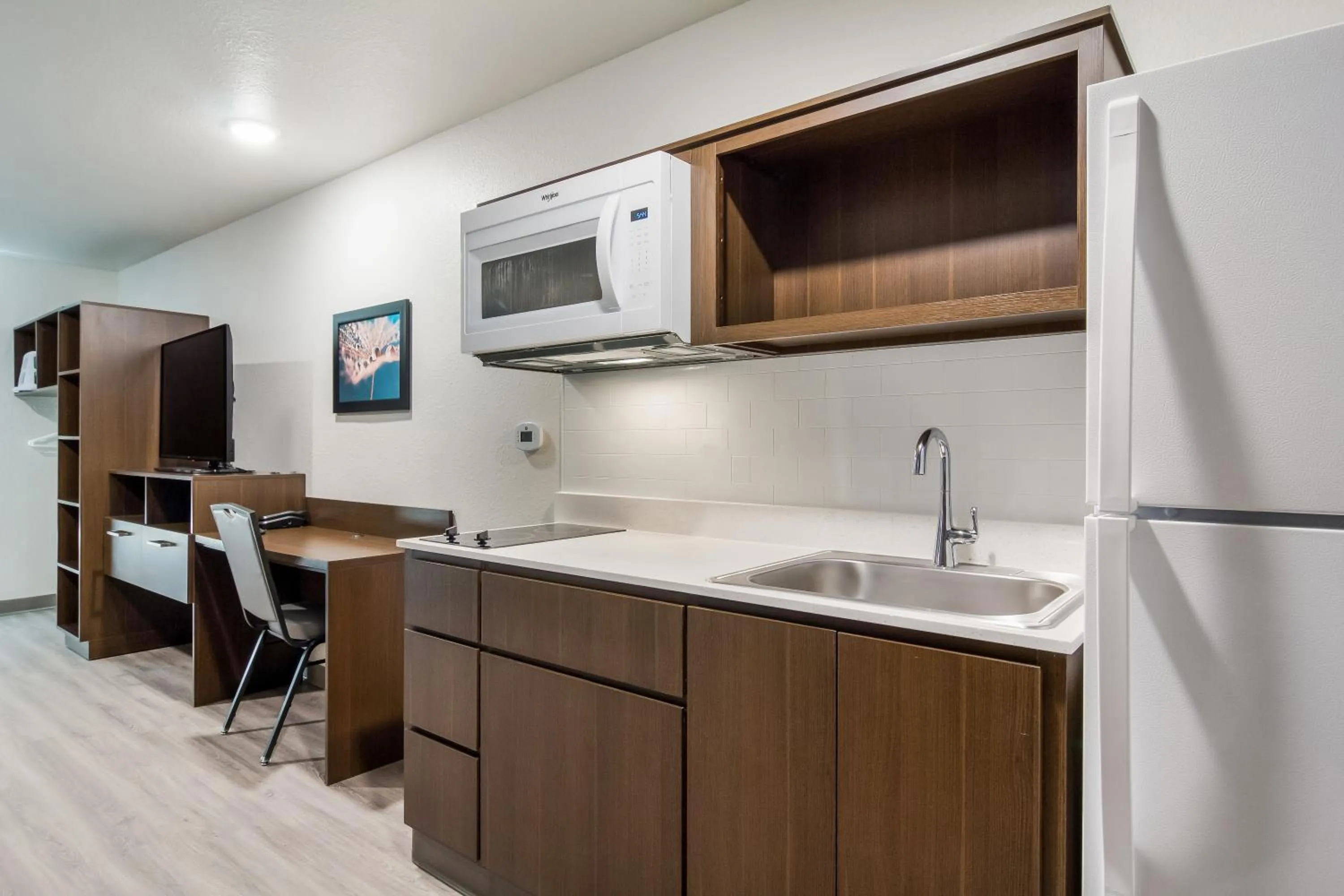 Kitchen or kitchenette in WoodSpring Suites Dearborn Detroit