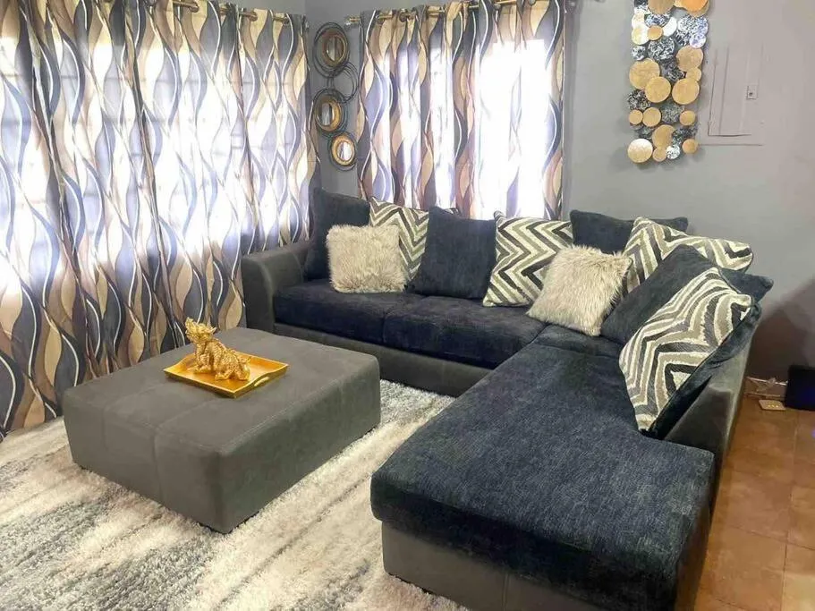 Living room in Blissett Apt, Your Jamaican Home