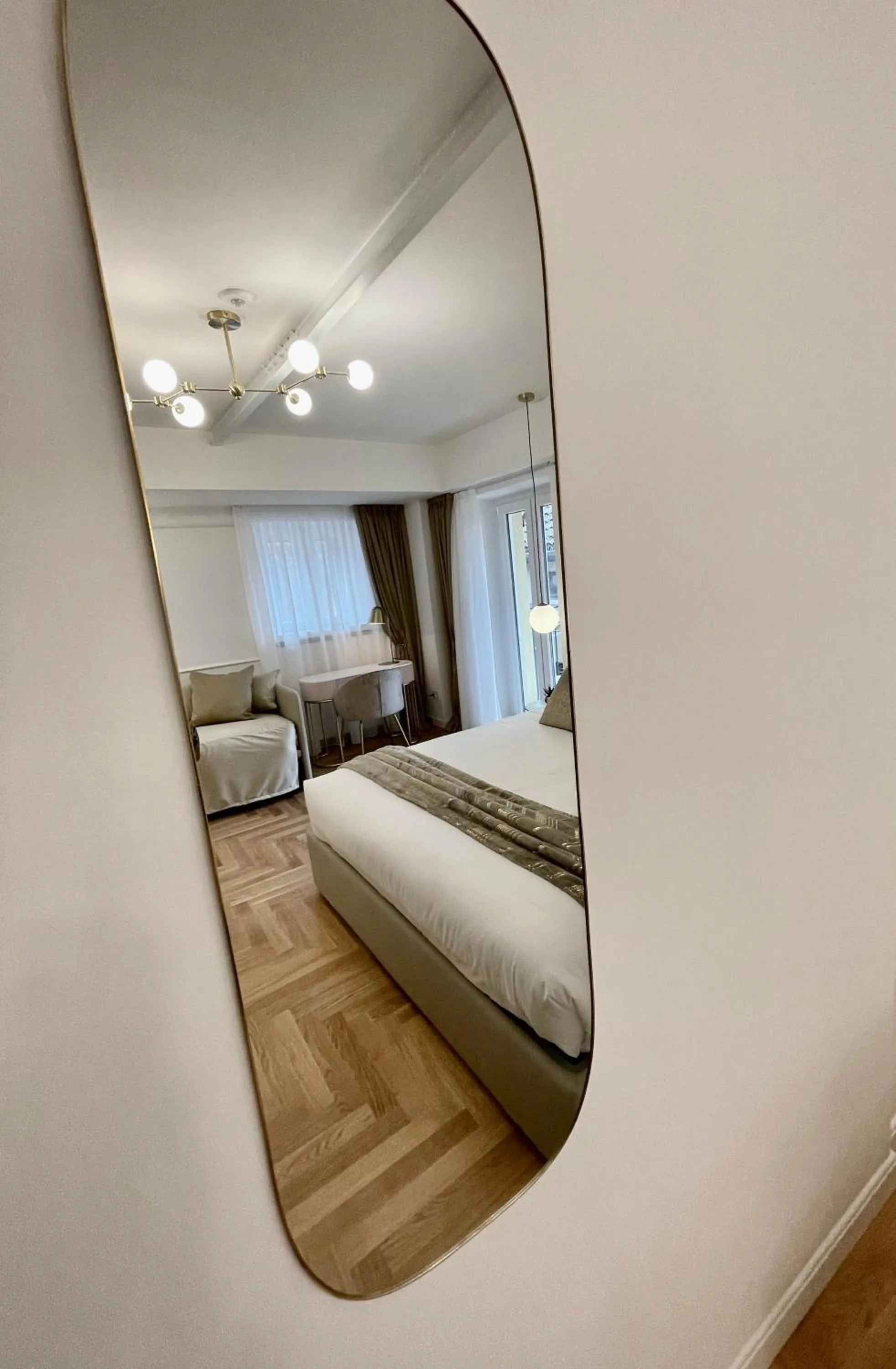 Bed in Bellagio Luxury Suites Apartments