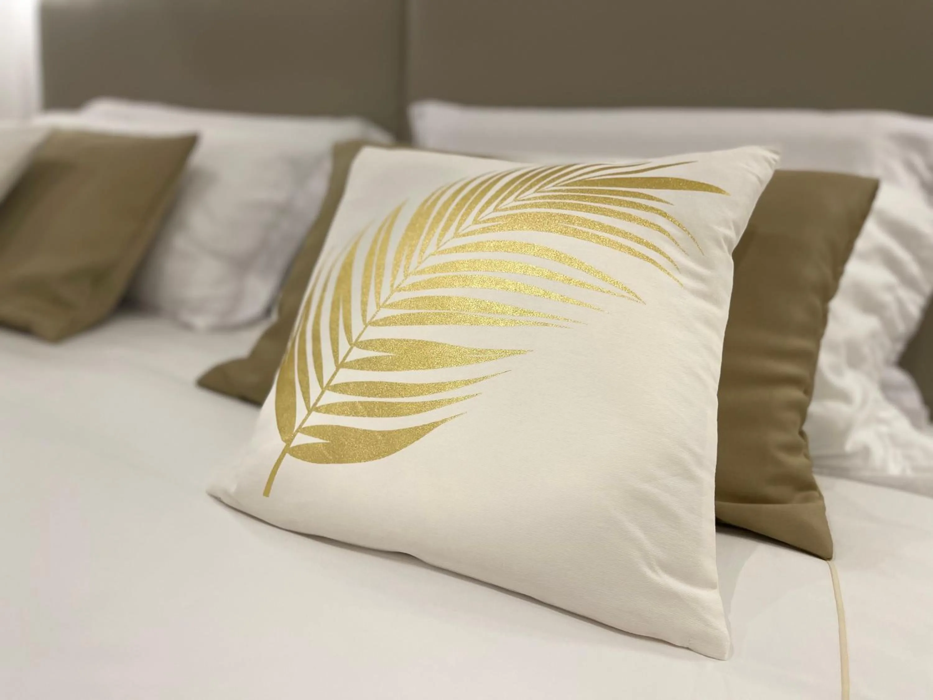 Bed in Bellagio Luxury Suites Apartments