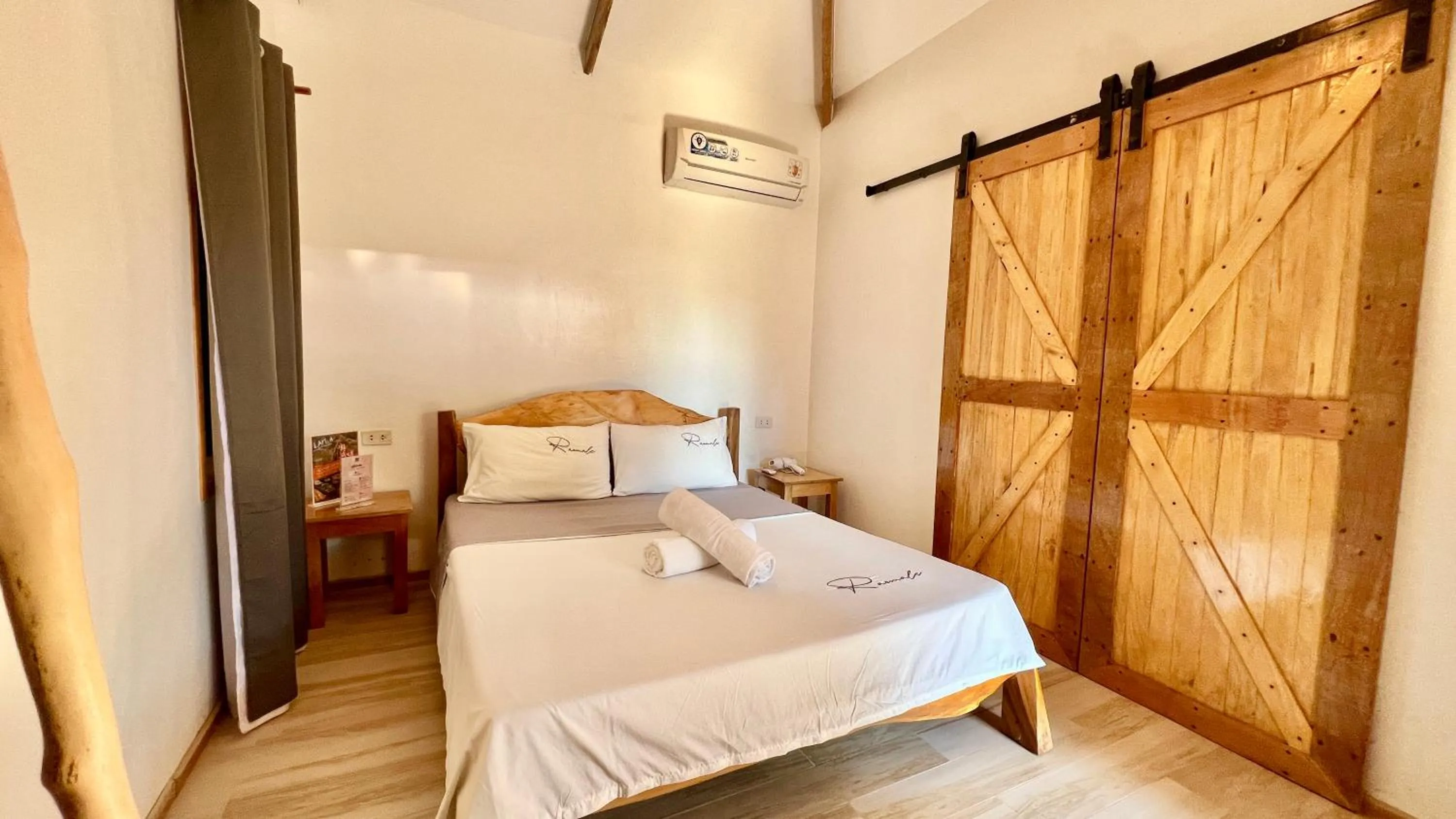 Bed in AA Jungle Guesthouse Deluxe