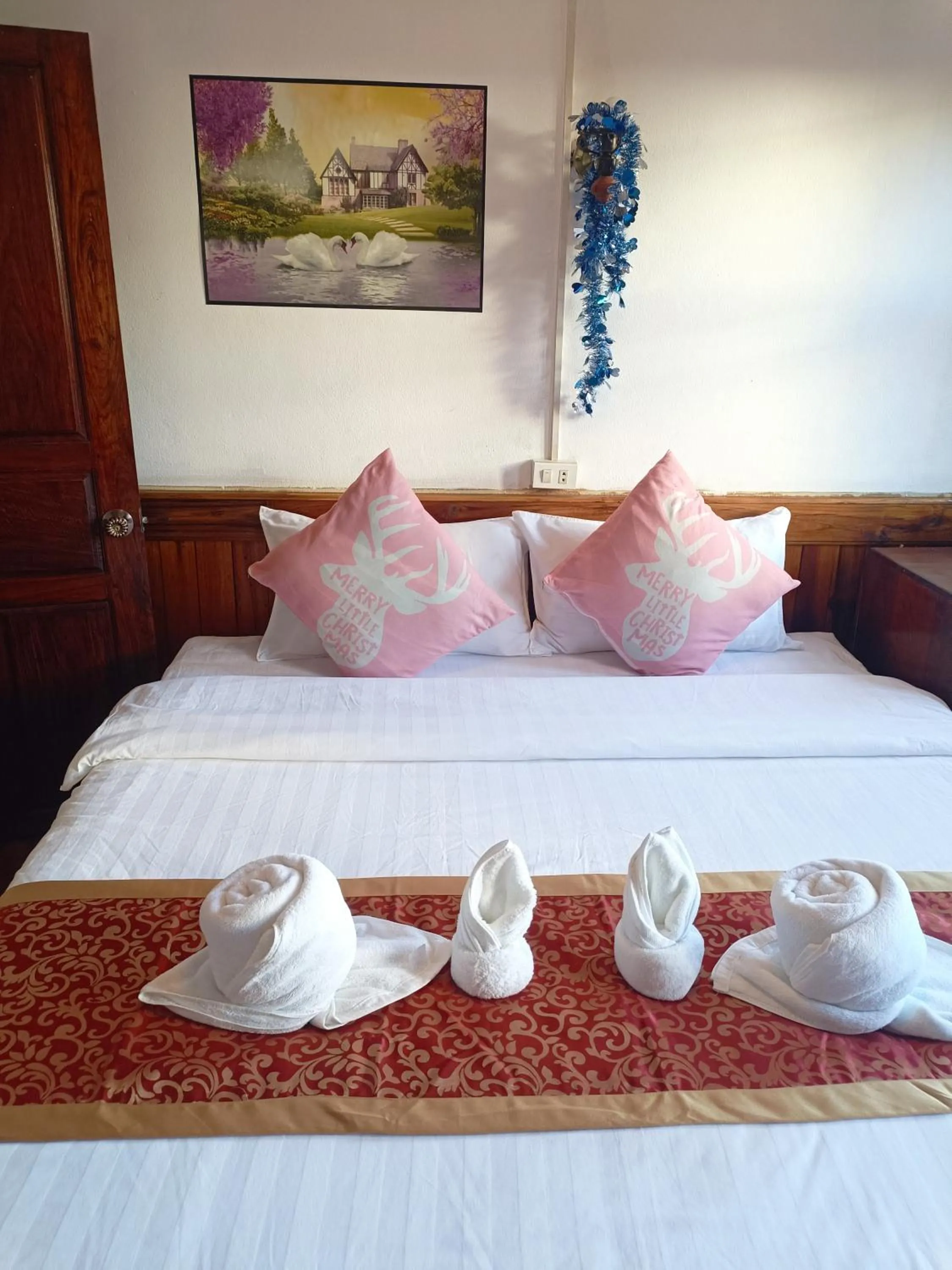 Bed in KONGKHAM GUESTHOUSE