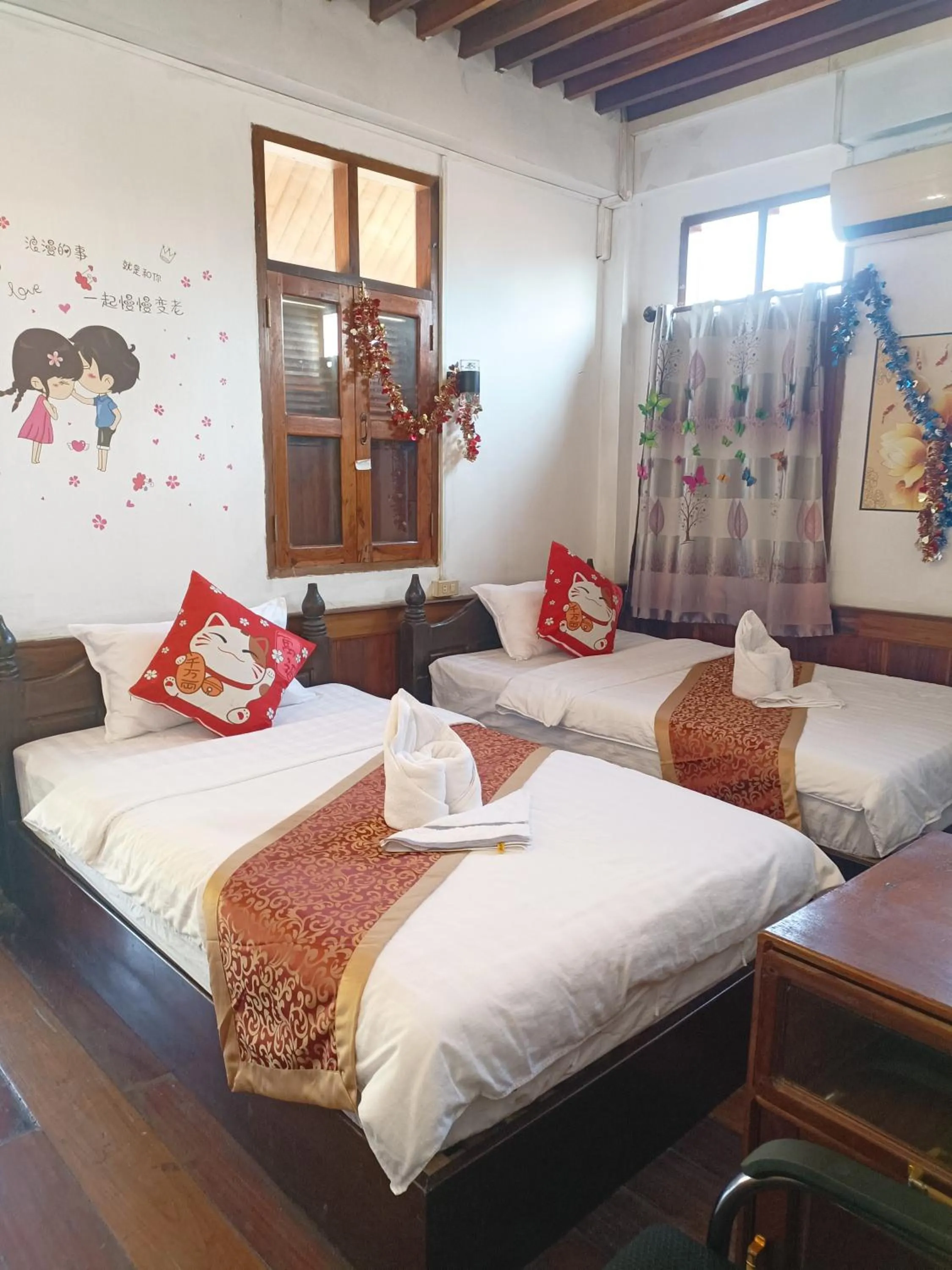 Bed in KONGKHAM GUESTHOUSE