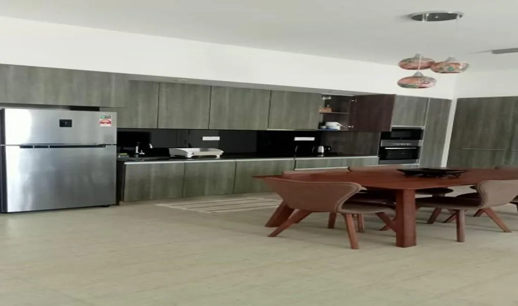 Kitchen or kitchenette in By The Sea Batu Ferringhi