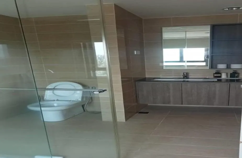 Bathroom in By The Sea Batu Ferringhi