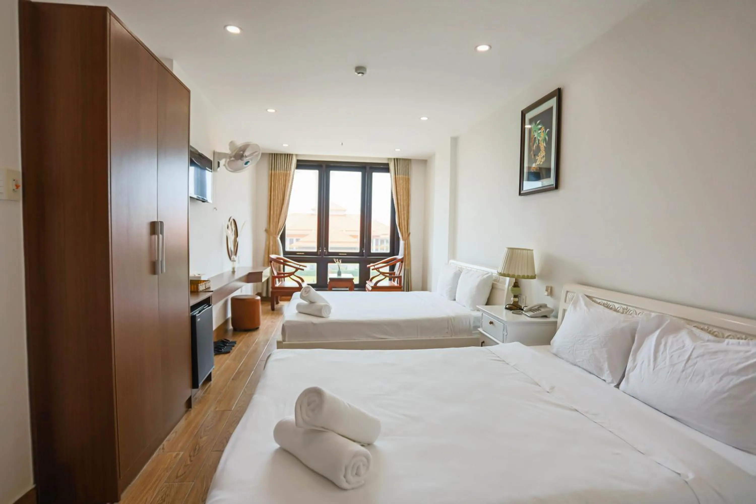 Bed in SeaColor Beachstay Danang Hotel by Haviland