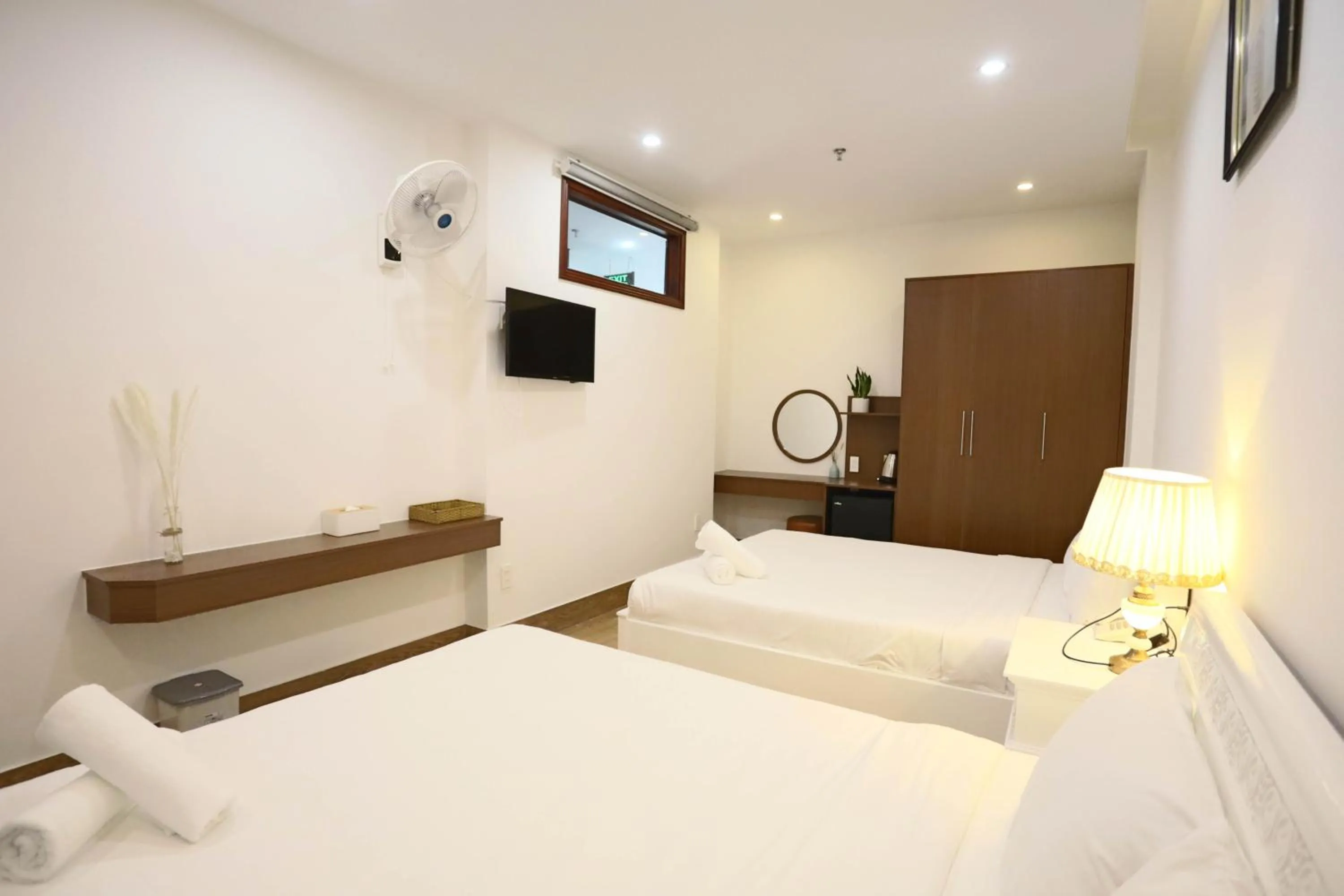 Bed in SeaColor Beachstay Danang Hotel by Haviland