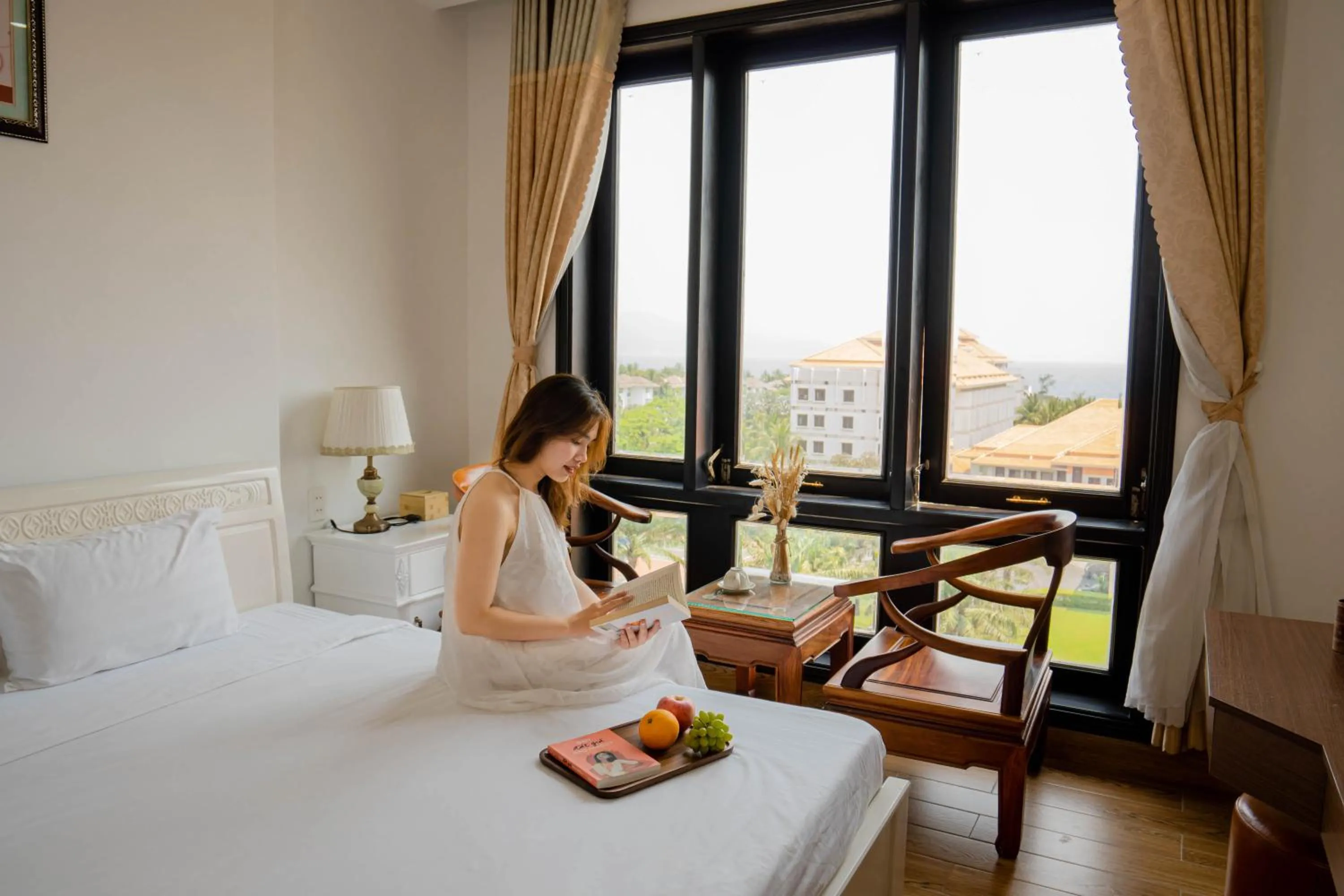 People, Bed in SeaColor Beachstay Danang Hotel by Haviland