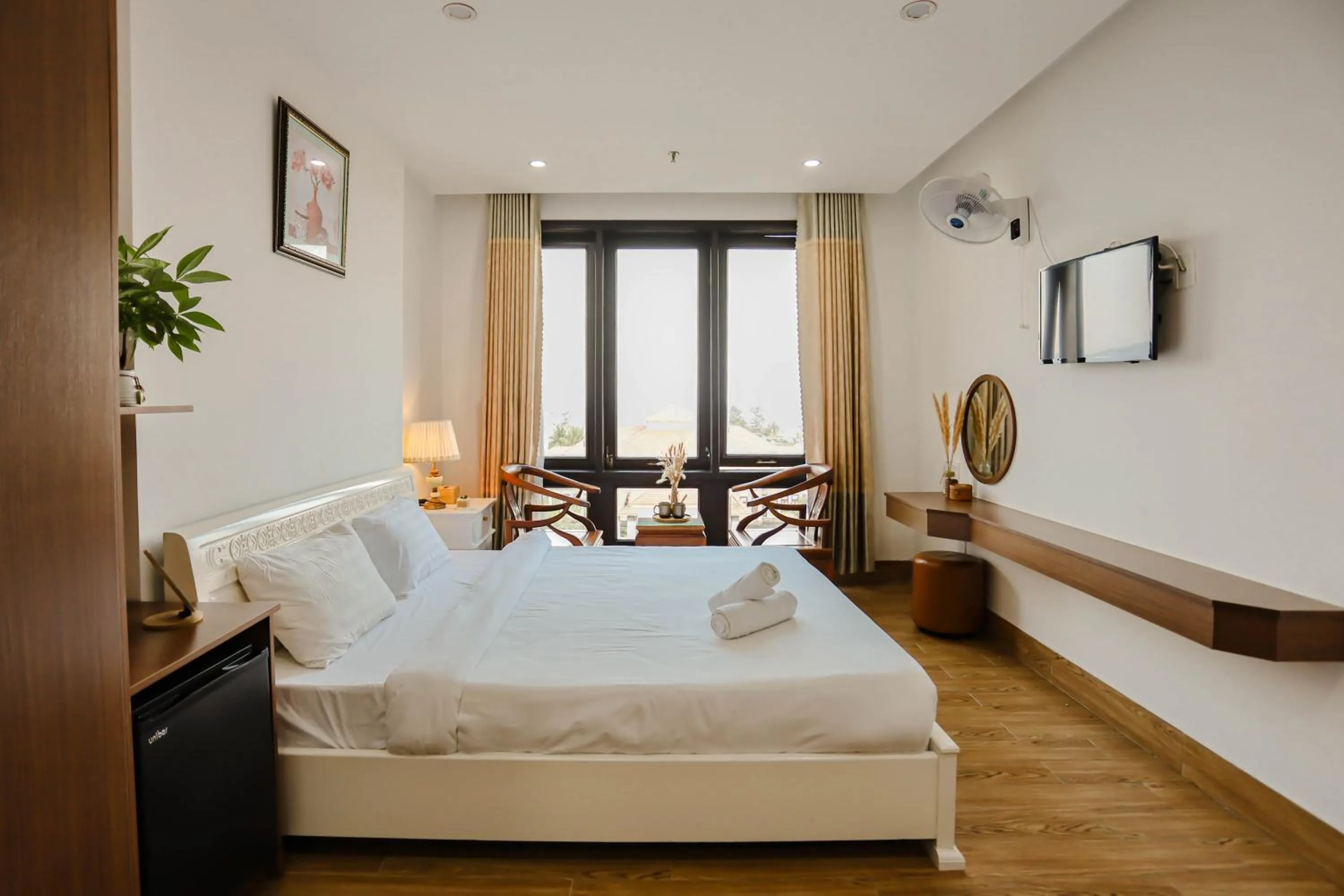 Photo of the whole room, Bed in SeaColor Beachstay Danang Hotel by Haviland