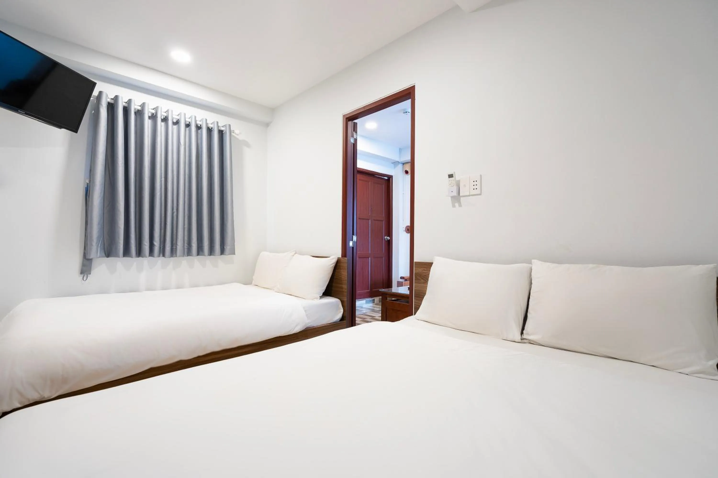 Bed in Ahu Hotel & Apartment