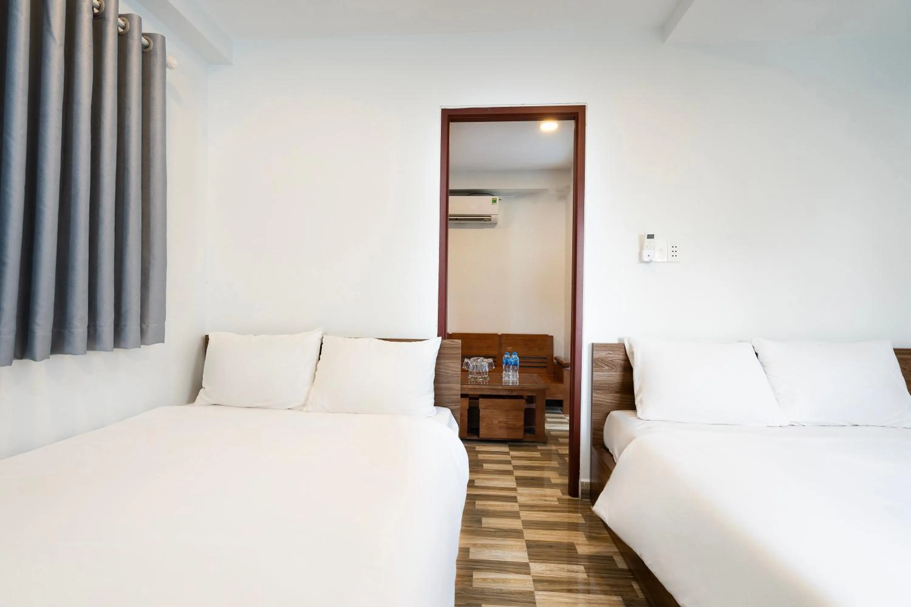 Bed in Ahu Hotel & Apartment