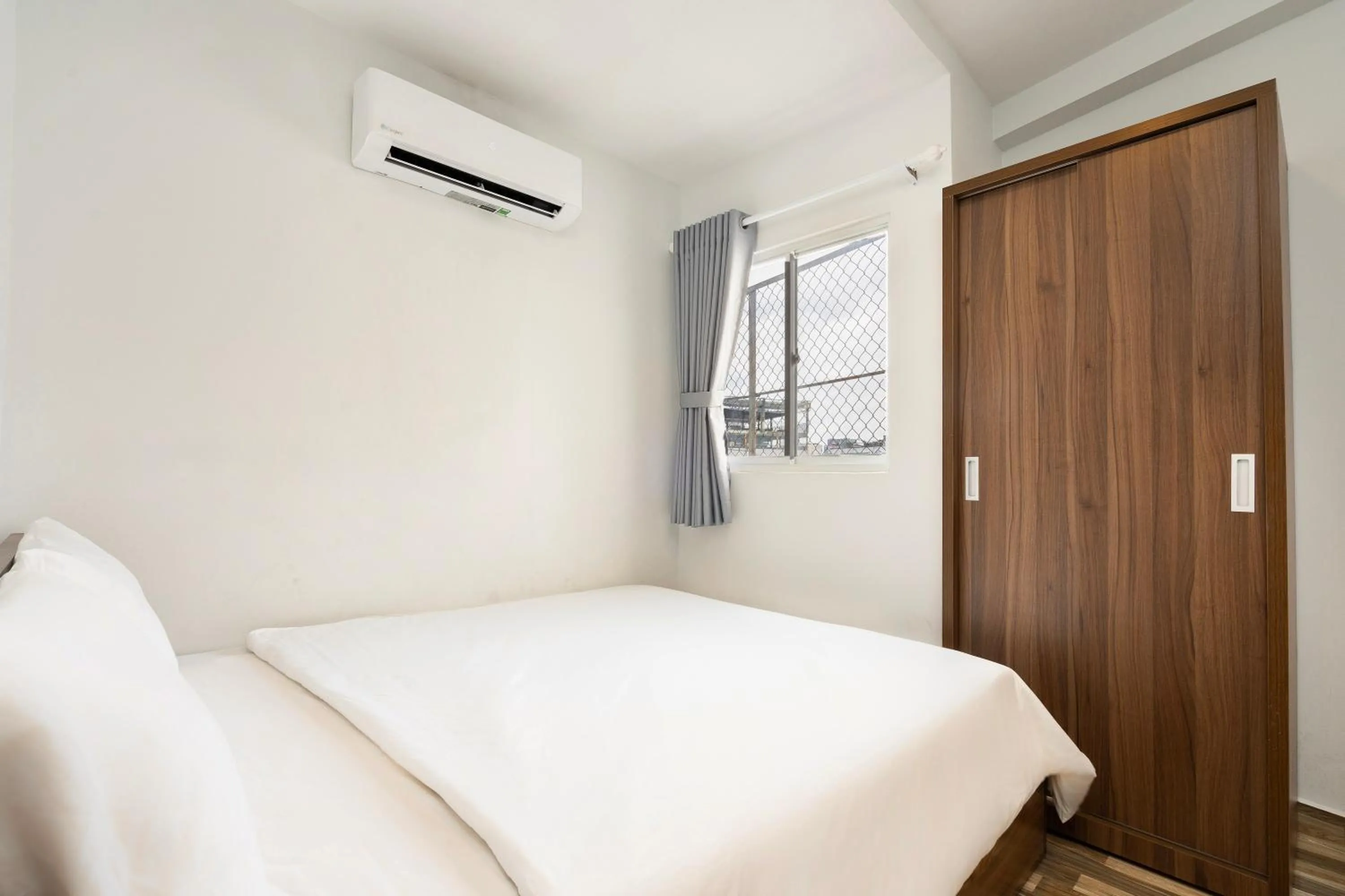 Bed in Ahu Hotel & Apartment