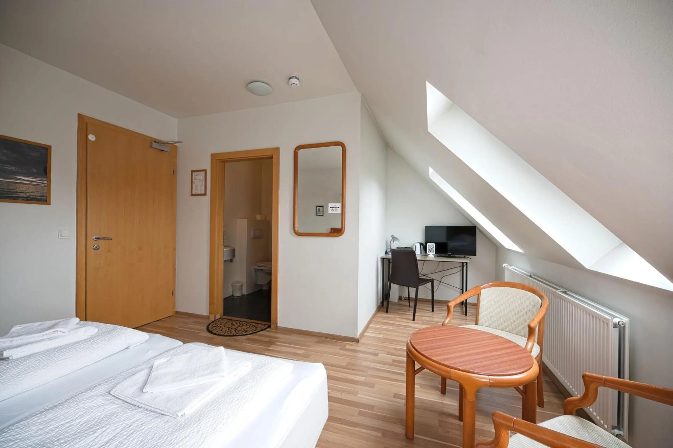 Photo of the whole room, Bed in Hotel Laxnes