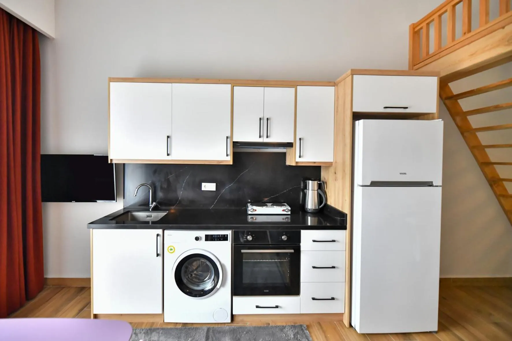 Kitchen or kitchenette in RED MOON SUITES