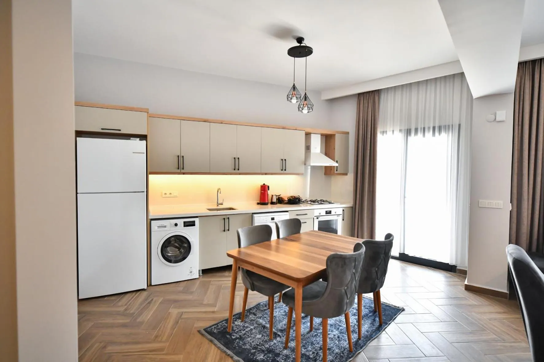 Kitchen or kitchenette in RED MOON SUITES