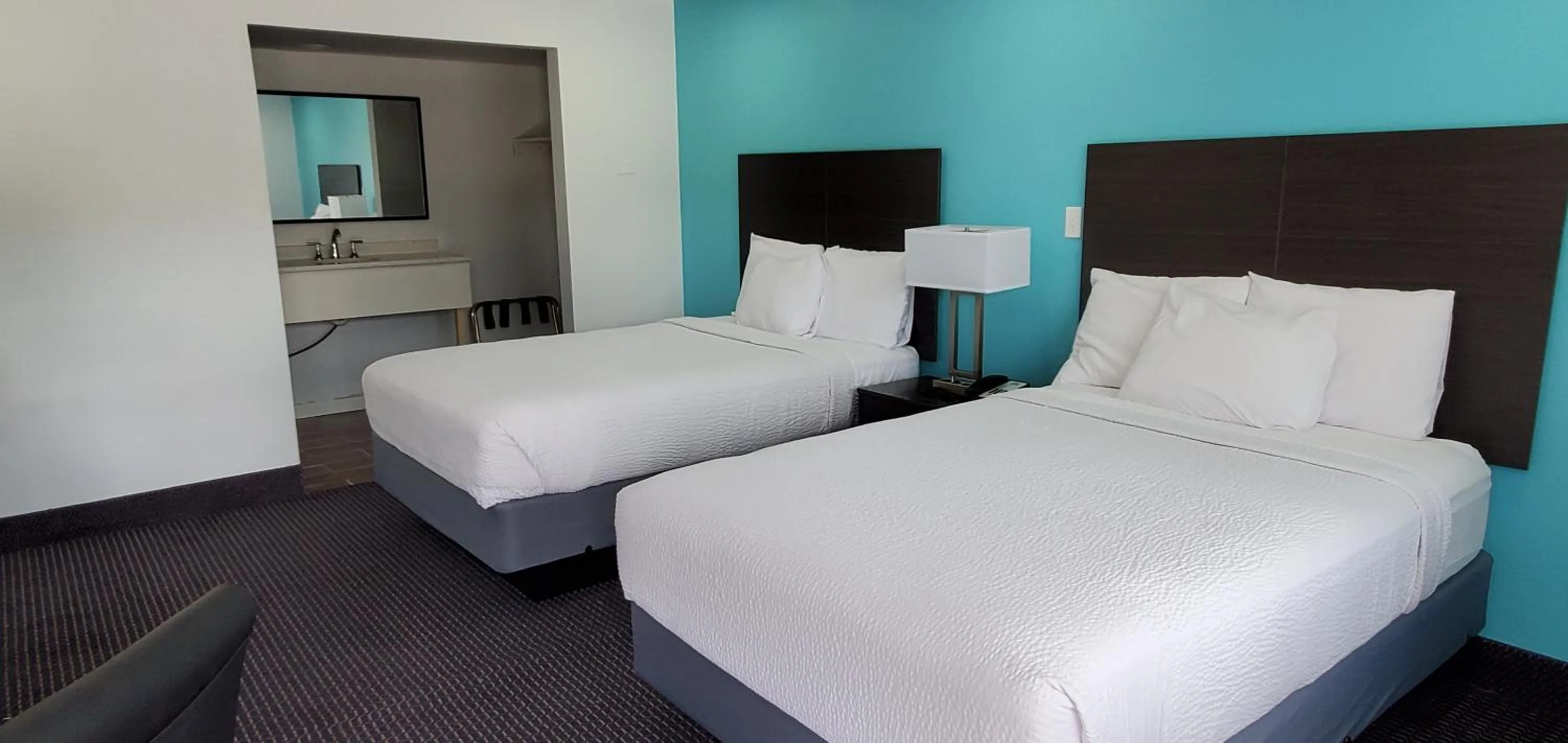 Photo of the whole room, Bed in Travelodge by Wyndham Livonia Canton Novi Detroit Area